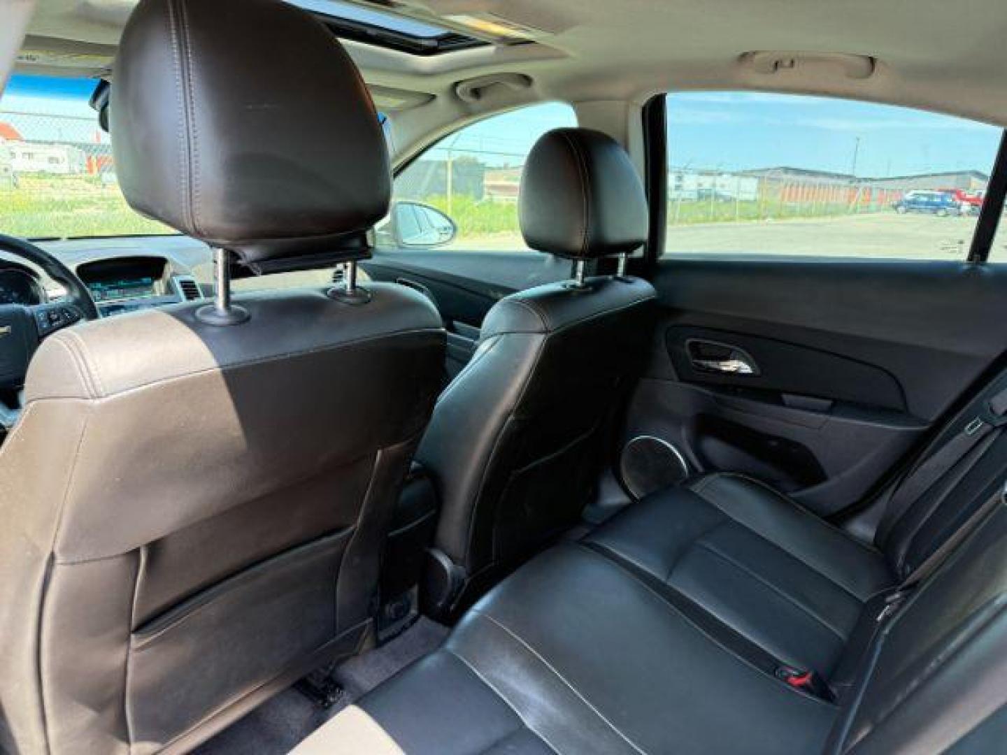 2011 Summit White /Jet Black Chevrolet Cruze LTZ (1G1PH5S96B7) with an Ecotec 1.4L I-4 DOHC engine, AUTOMATIC transmission, located at 1235 N Woodruff Ave., Idaho Falls, 83401, (208) 523-1053, 43.507172, -112.000488 - At Timberline Auto, finding a great deal on your next vehicle is always easy! Our experienced sales staff's goal is to help find you the right vehicle at the right price! Our knowledgeable finance department has options for almost any credit score. We offer extended service contract options to prote - Photo#17