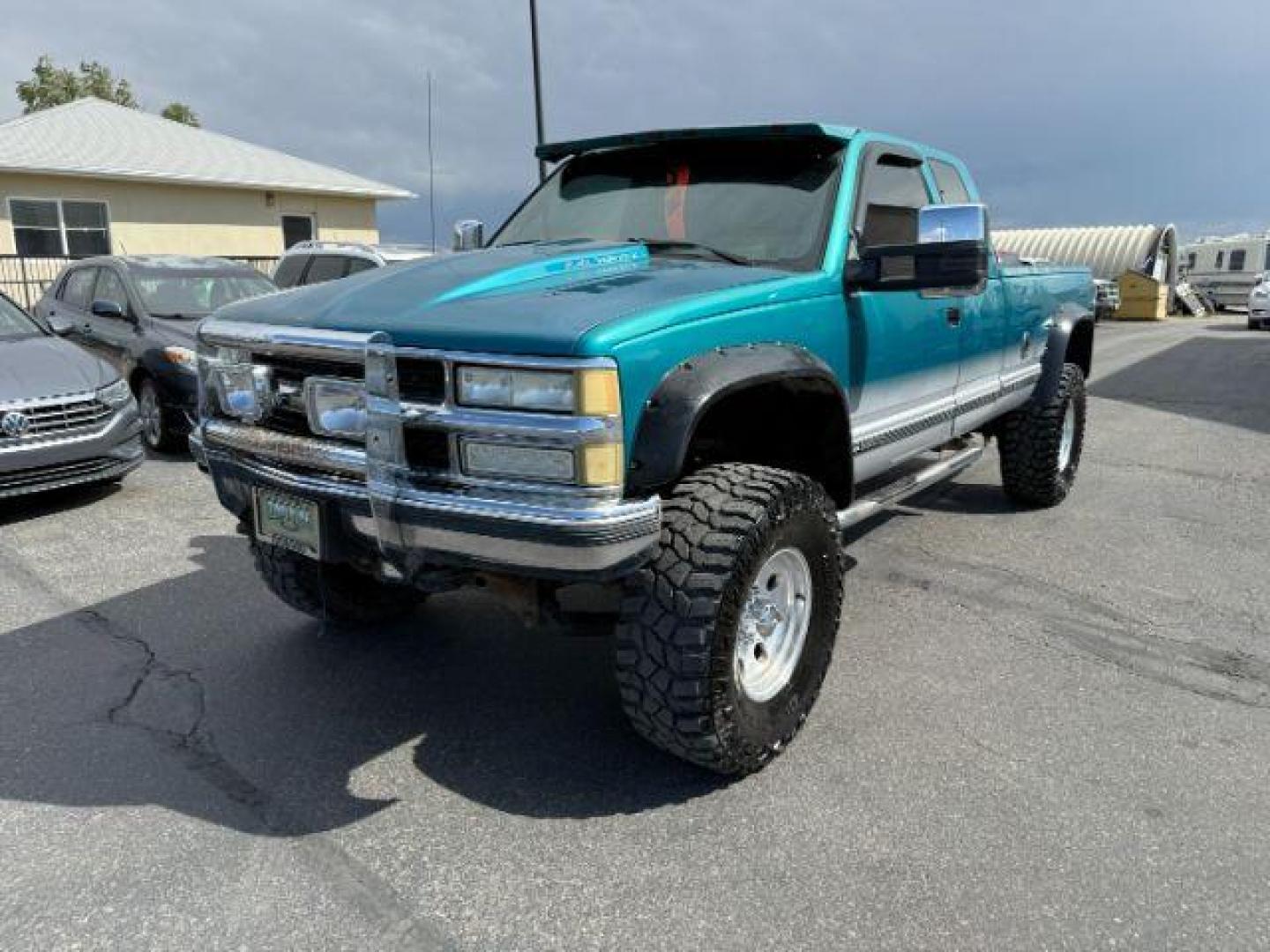 1994 GREEN /CLOTH Chevrolet K2500 (1GCGK29N6RE) with an 74L V-8 regular unleaded engine, Automatic transmission, located at 1175 N Woodruff Ave, Idaho Falls, ID, 83401, 43.506901, -111.999657 - At Timberline Auto, finding a great deal on your next vehicle is always easy! Our experienced sales staff's goal is to help find you the right vehicle at the right price! Our knowledgeable finance department has options for almost any credit score. We offer extended service contract options to prote - Photo#0