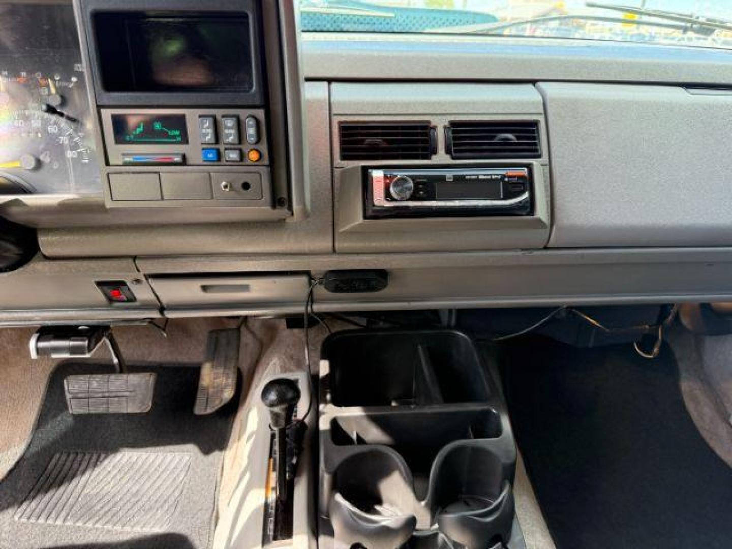 1994 GREEN /CLOTH Chevrolet K2500 (1GCGK29N6RE) with an 74L V-8 regular unleaded engine, Automatic transmission, located at 1175 N Woodruff Ave, Idaho Falls, ID, 83401, 43.506901, -111.999657 - At Timberline Auto, finding a great deal on your next vehicle is always easy! Our experienced sales staff's goal is to help find you the right vehicle at the right price! Our knowledgeable finance department has options for almost any credit score. We offer extended service contract options to prote - Photo#14