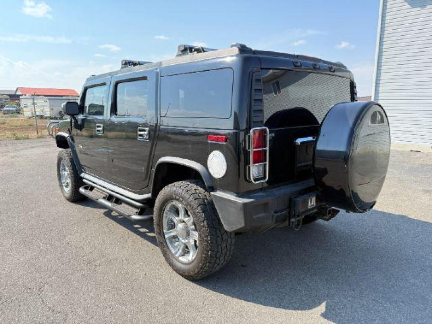 2005 BLACK /LEATHER Hummer H2 SUV (5GRGN23U15H) with an 60 engine, Automatic transmission, located at 1175 N Woodruff Ave, Idaho Falls, ID, 83401, 43.506901, -111.999657 - At Timberline Auto, finding a great deal on your next vehicle is always easy! Our experienced sales staff's goal is to help find you the right vehicle at the right price! Our knowledgeable finance department has options for almost any credit score. We offer extended service contract options to prote - Photo#3