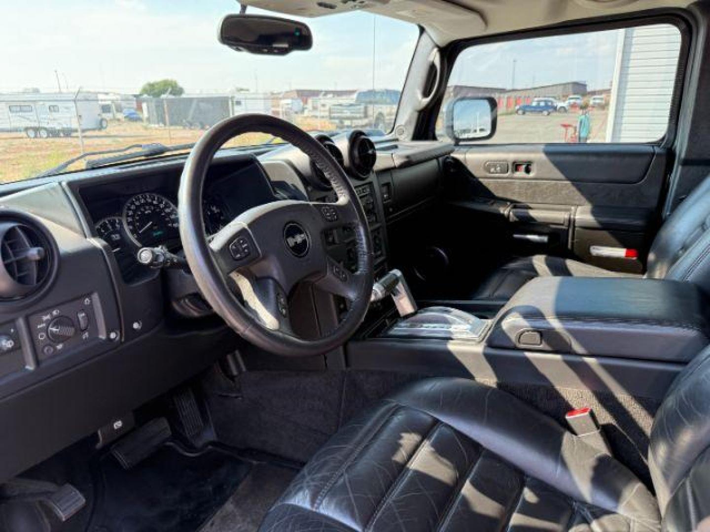 2005 BLACK /LEATHER Hummer H2 SUV (5GRGN23U15H) with an 60 engine, Automatic transmission, located at 1175 N Woodruff Ave, Idaho Falls, ID, 83401, 43.506901, -111.999657 - At Timberline Auto, finding a great deal on your next vehicle is always easy! Our experienced sales staff's goal is to help find you the right vehicle at the right price! Our knowledgeable finance department has options for almost any credit score. We offer extended service contract options to prote - Photo#12