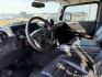 2005 BLACK /LEATHER Hummer H2 SUV (5GRGN23U15H) with an 60 engine, Automatic transmission, located at 1175 N Woodruff Ave, Idaho Falls, ID, 83401, 43.506901, -111.999657 - At Timberline Auto, finding a great deal on your next vehicle is always easy! Our experienced sales staff's goal is to help find you the right vehicle at the right price! Our knowledgeable finance department has options for almost any credit score. We offer extended service contract options to prote - Photo#12