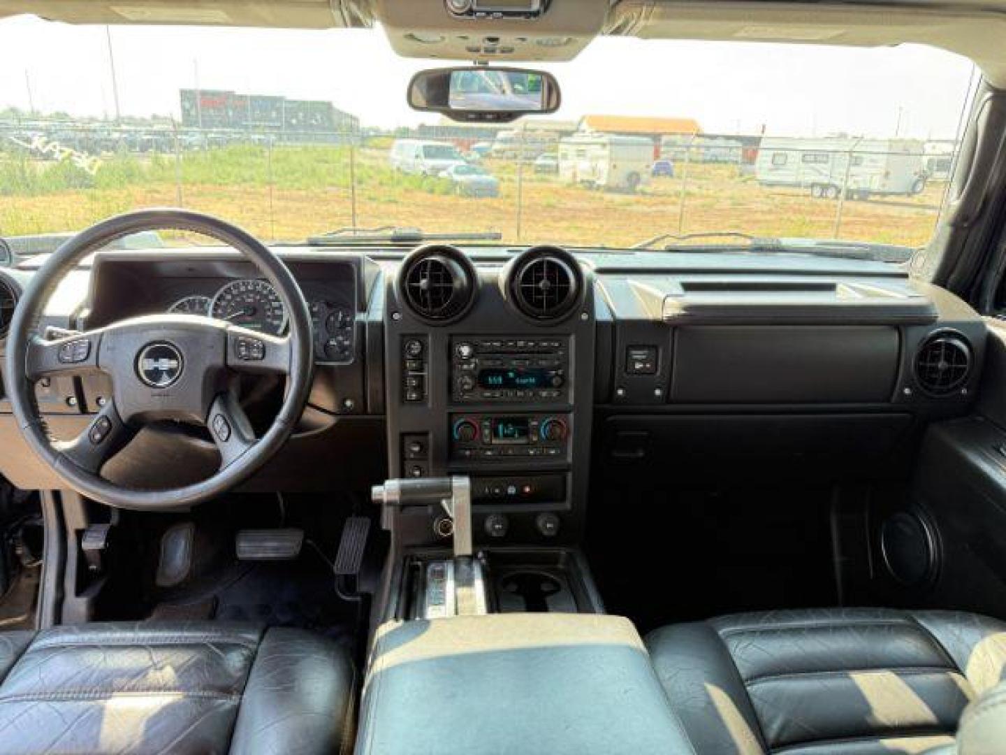 2005 BLACK /LEATHER Hummer H2 SUV (5GRGN23U15H) with an 60 engine, Automatic transmission, located at 1175 N Woodruff Ave, Idaho Falls, ID, 83401, 43.506901, -111.999657 - At Timberline Auto, finding a great deal on your next vehicle is always easy! Our experienced sales staff's goal is to help find you the right vehicle at the right price! Our knowledgeable finance department has options for almost any credit score. We offer extended service contract options to prote - Photo#17