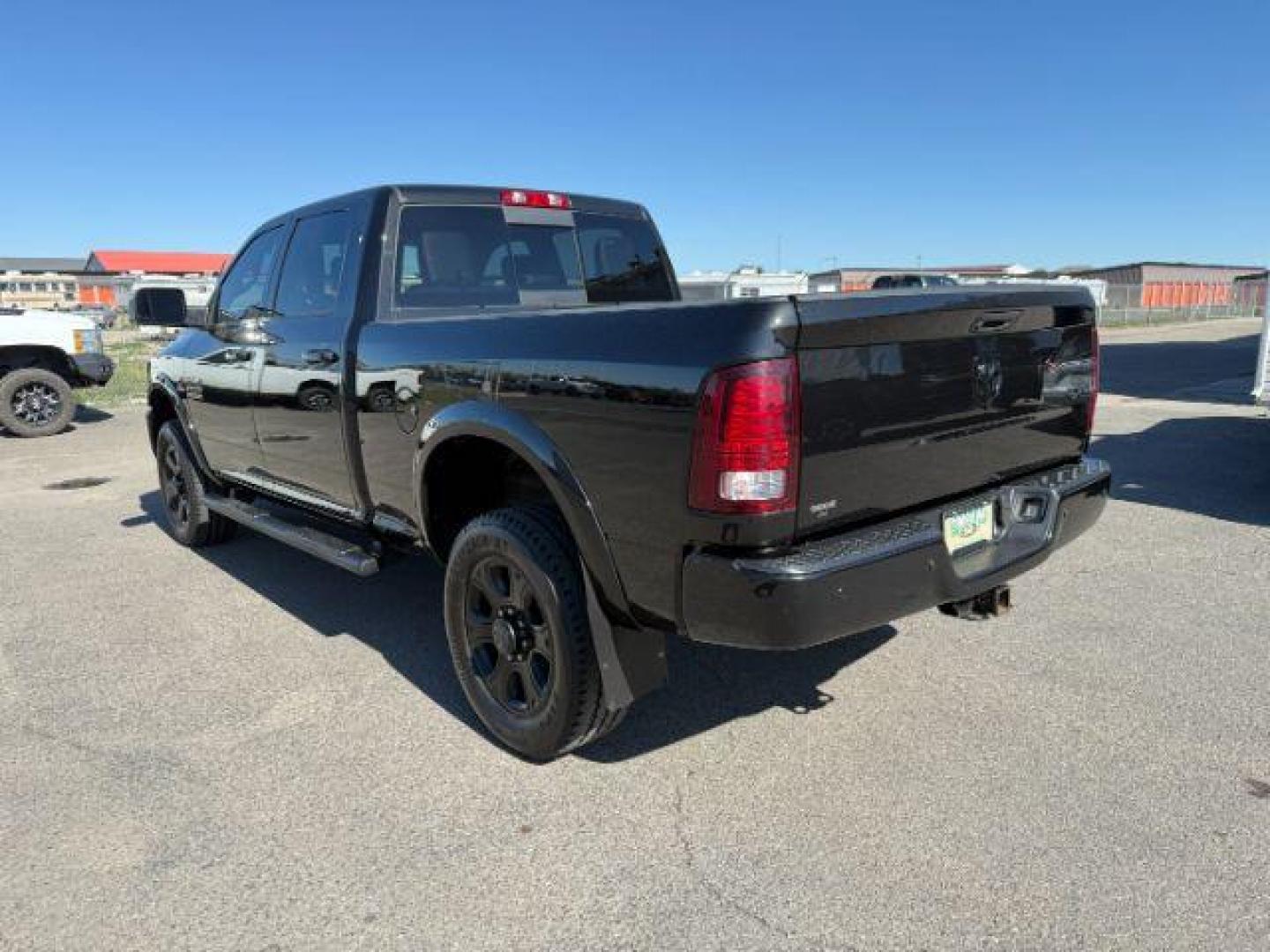 2018 BLACK /Black Ram 2500 Laramie Crew Cab 4x4 6'4 Box (3C6UR5FL3JG) with an 6.7 engine, AUTOMATIC transmission, located at 1235 N Woodruff Ave., Idaho Falls, 83401, (208) 523-1053, 43.507172, -112.000488 - At Timberline Auto, finding a great deal on your next vehicle is always easy! Our experienced sales staff's goal is to help find you the right vehicle at the right price! Our knowledgeable finance department has options for almost any credit score. We offer extended service contract options to prote - Photo#2