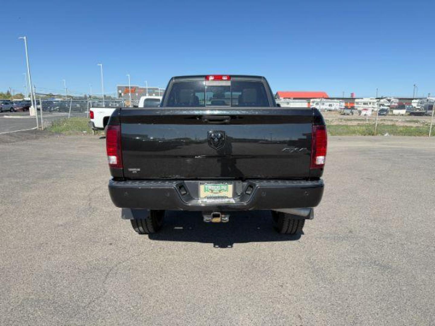 2018 BLACK /Black Ram 2500 Laramie Crew Cab 4x4 6'4 Box (3C6UR5FL3JG) with an 6.7 engine, AUTOMATIC transmission, located at 1235 N Woodruff Ave., Idaho Falls, 83401, (208) 523-1053, 43.507172, -112.000488 - At Timberline Auto, finding a great deal on your next vehicle is always easy! Our experienced sales staff's goal is to help find you the right vehicle at the right price! Our knowledgeable finance department has options for almost any credit score. We offer extended service contract options to prote - Photo#3