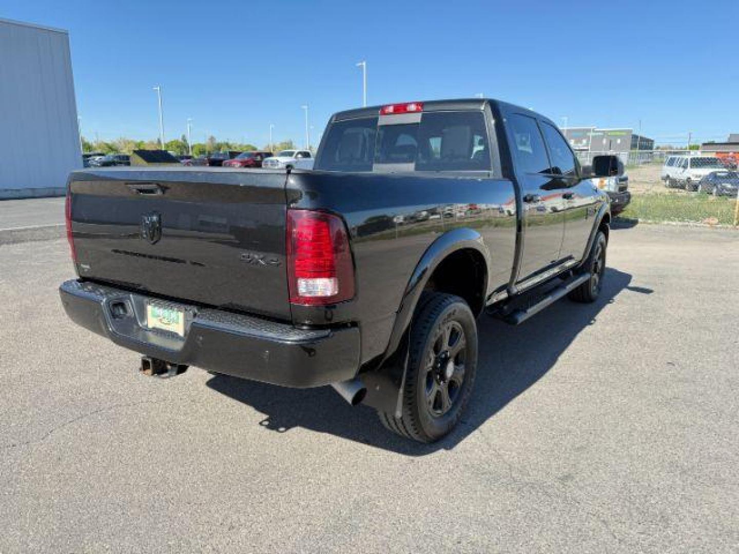 2018 BLACK /Black Ram 2500 Laramie Crew Cab 4x4 6'4 Box (3C6UR5FL3JG) with an 6.7 engine, AUTOMATIC transmission, located at 1235 N Woodruff Ave., Idaho Falls, 83401, (208) 523-1053, 43.507172, -112.000488 - At Timberline Auto, finding a great deal on your next vehicle is always easy! Our experienced sales staff's goal is to help find you the right vehicle at the right price! Our knowledgeable finance department has options for almost any credit score. We offer extended service contract options to prote - Photo#6