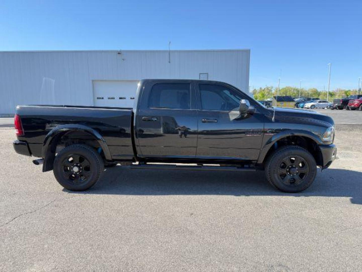 2018 BLACK /Black Ram 2500 Laramie Crew Cab 4x4 6'4 Box (3C6UR5FL3JG) with an 6.7 engine, AUTOMATIC transmission, located at 1235 N Woodruff Ave., Idaho Falls, 83401, (208) 523-1053, 43.507172, -112.000488 - At Timberline Auto, finding a great deal on your next vehicle is always easy! Our experienced sales staff's goal is to help find you the right vehicle at the right price! Our knowledgeable finance department has options for almost any credit score. We offer extended service contract options to prote - Photo#7