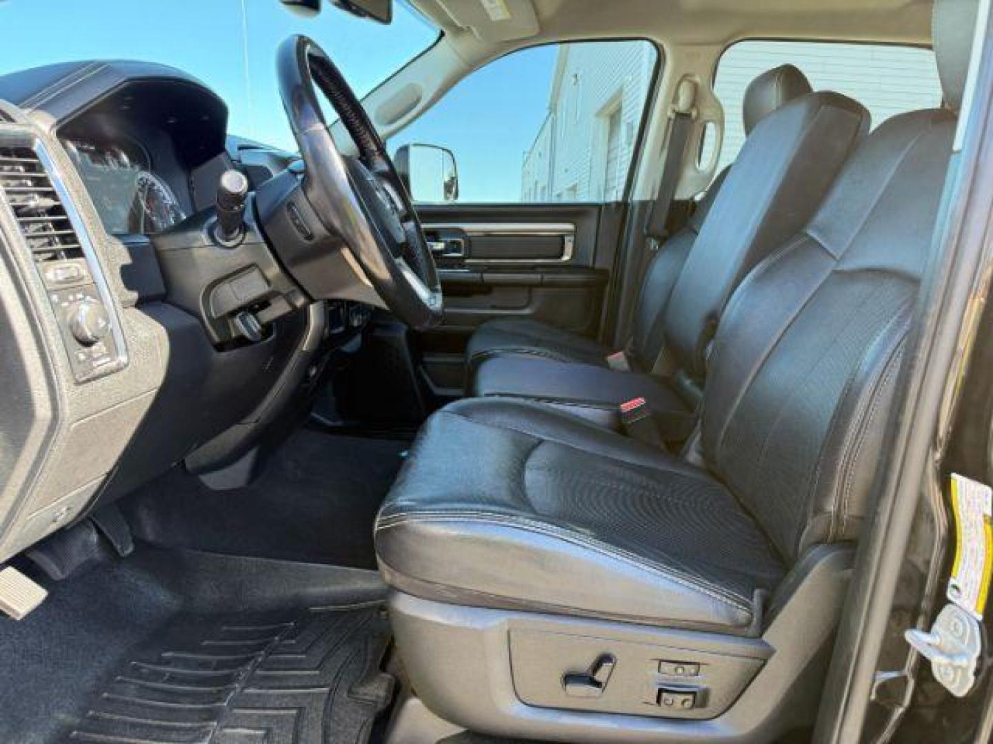 2018 BLACK /Black Ram 2500 Laramie Crew Cab 4x4 6'4 Box (3C6UR5FL3JG) with an 6.7 engine, AUTOMATIC transmission, located at 1235 N Woodruff Ave., Idaho Falls, 83401, (208) 523-1053, 43.507172, -112.000488 - At Timberline Auto, finding a great deal on your next vehicle is always easy! Our experienced sales staff's goal is to help find you the right vehicle at the right price! Our knowledgeable finance department has options for almost any credit score. We offer extended service contract options to prote - Photo#11