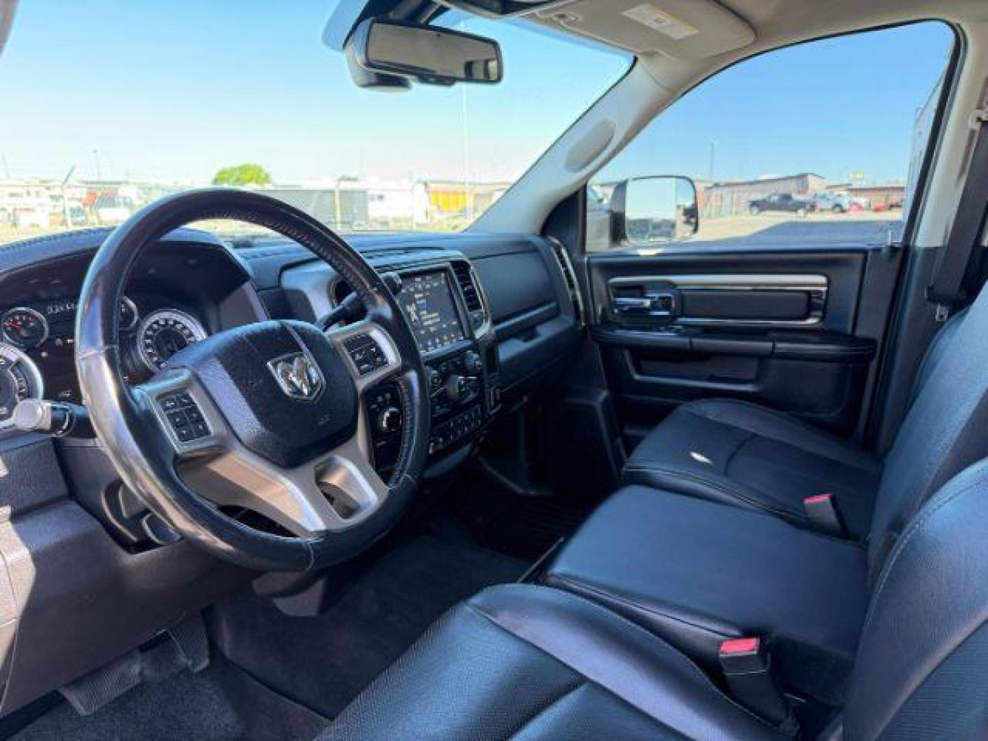 2018 BLACK /Black Ram 2500 Laramie Crew Cab 4x4 6'4 Box (3C6UR5FL3JG) with an 6.7 engine, AUTOMATIC transmission, located at 1235 N Woodruff Ave., Idaho Falls, 83401, (208) 523-1053, 43.507172, -112.000488 - At Timberline Auto, finding a great deal on your next vehicle is always easy! Our experienced sales staff's goal is to help find you the right vehicle at the right price! Our knowledgeable finance department has options for almost any credit score. We offer extended service contract options to prote - Photo#12