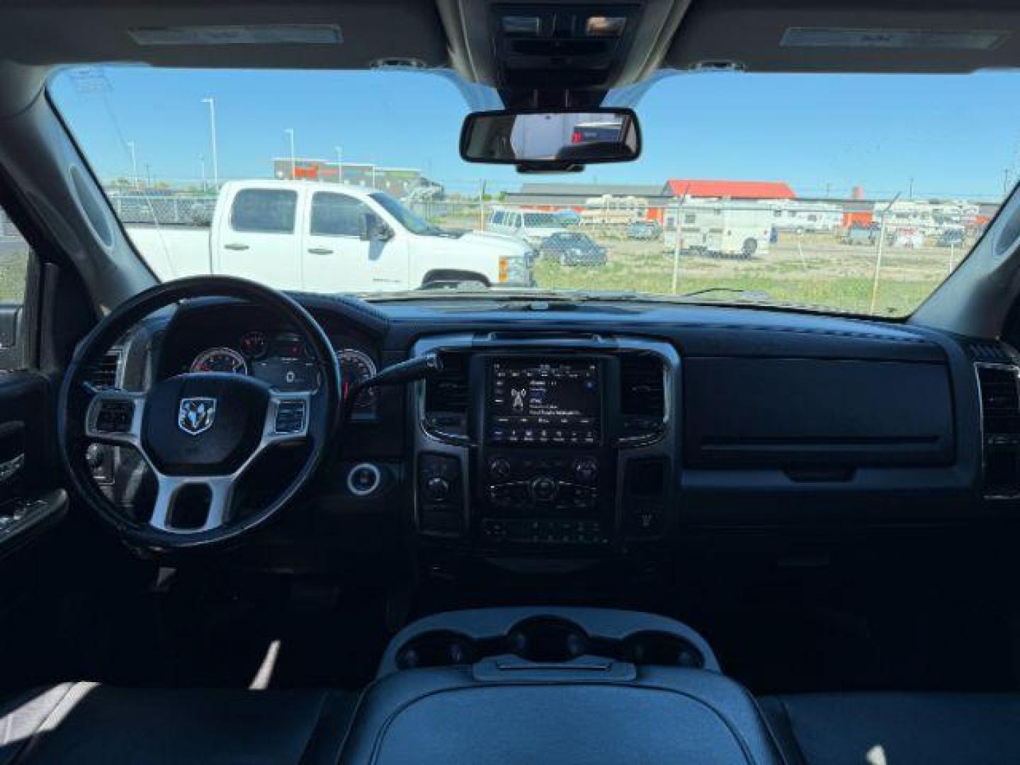 2018 BLACK /Black Ram 2500 Laramie Crew Cab 4x4 6'4 Box (3C6UR5FL3JG) with an 6.7 engine, AUTOMATIC transmission, located at 1235 N Woodruff Ave., Idaho Falls, 83401, (208) 523-1053, 43.507172, -112.000488 - At Timberline Auto, finding a great deal on your next vehicle is always easy! Our experienced sales staff's goal is to help find you the right vehicle at the right price! Our knowledgeable finance department has options for almost any credit score. We offer extended service contract options to prote - Photo#19