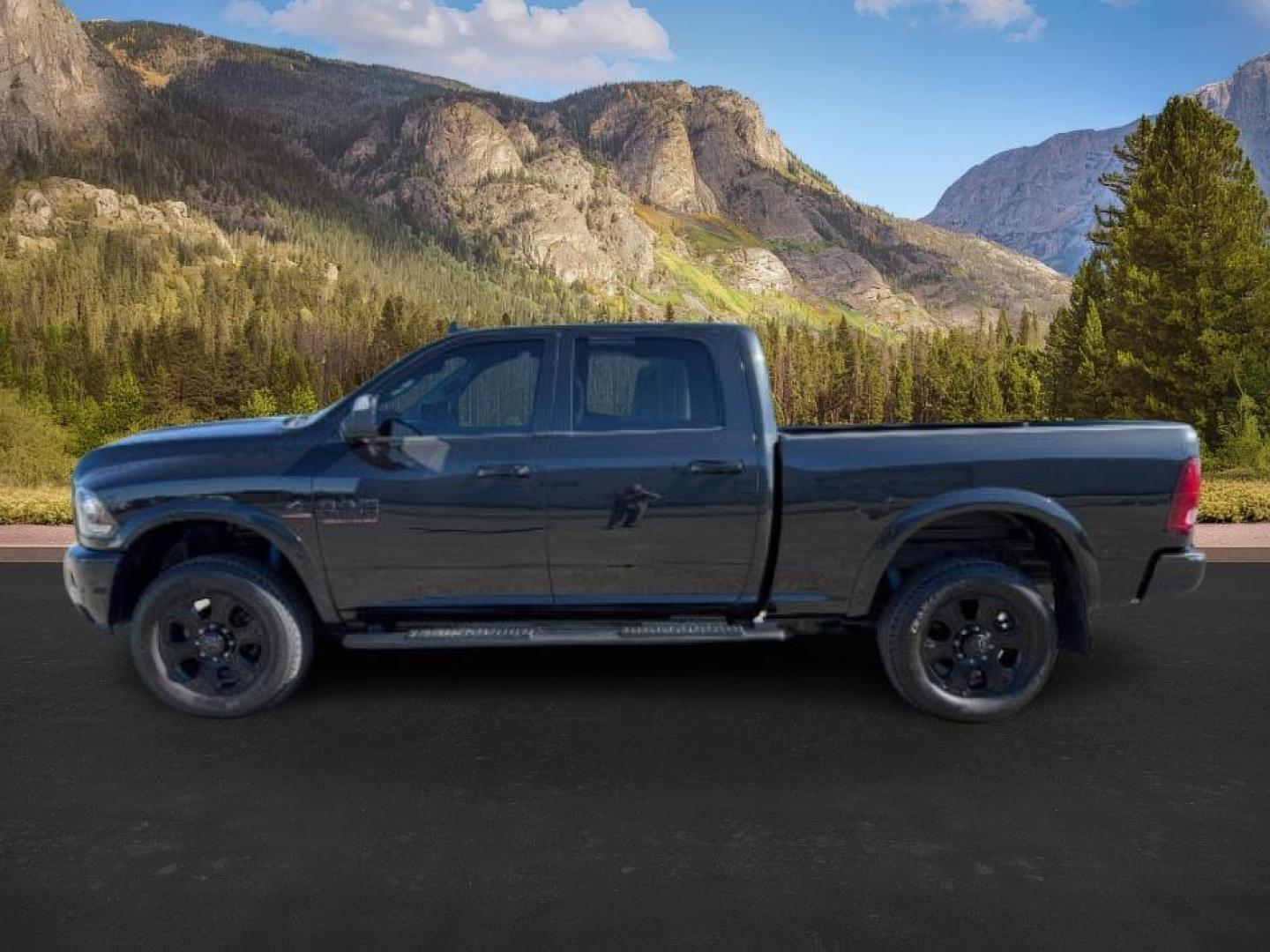 2018 BLACK /Black Ram 2500 Laramie Crew Cab 4x4 6'4 Box (3C6UR5FL3JG) with an 6.7 engine, AUTOMATIC transmission, located at 1235 N Woodruff Ave., Idaho Falls, 83401, (208) 523-1053, 43.507172, -112.000488 - At Timberline Auto, finding a great deal on your next vehicle is always easy! Our experienced sales staff's goal is to help find you the right vehicle at the right price! Our knowledgeable finance department has options for almost any credit score. We offer extended service contract options to prote - Photo#1
