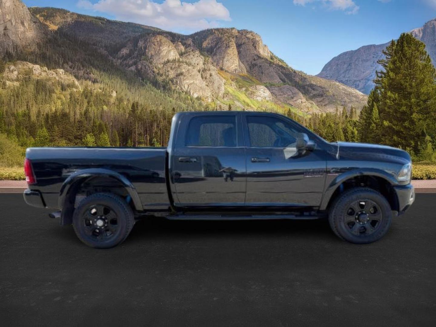 2018 BLACK /Black Ram 2500 Laramie Crew Cab 4x4 6'4 Box (3C6UR5FL3JG) with an 6.7 engine, AUTOMATIC transmission, located at 1235 N Woodruff Ave., Idaho Falls, 83401, (208) 523-1053, 43.507172, -112.000488 - At Timberline Auto, finding a great deal on your next vehicle is always easy! Our experienced sales staff's goal is to help find you the right vehicle at the right price! Our knowledgeable finance department has options for almost any credit score. We offer extended service contract options to prote - Photo#7