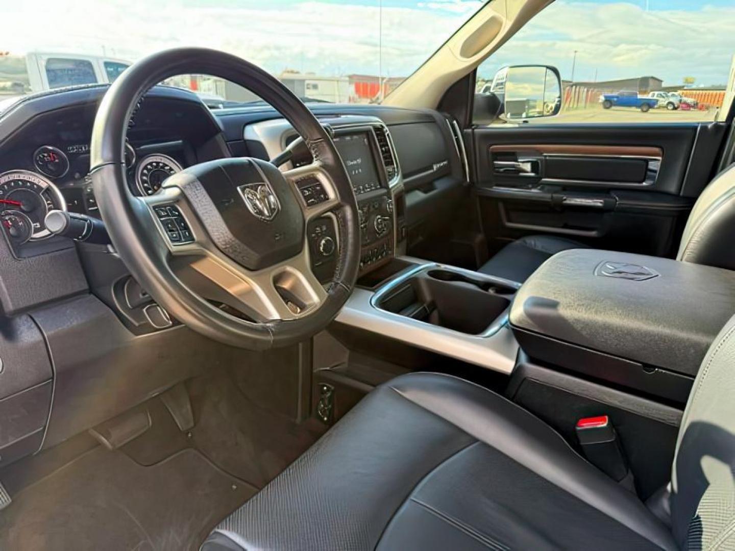 2018 True Blue Pearlcoat /Black Ram 2500 Laramie Crew Cab 4x4 6'4 Box (3C6UR5FJ9JG) with an HEMI 6.4L V-8 VVT variable valve control engine, AUTOMATIC transmission, located at 1235 N Woodruff Ave., Idaho Falls, 83401, (208) 523-1053, 43.507172, -112.000488 - At Timberline Auto, finding a great deal on your next vehicle is always easy! Our experienced sales staff's goal is to help find you the right vehicle at the right price! Our knowledgeable finance department has options for almost any credit score. We offer extended service contract options to prote - Photo#12