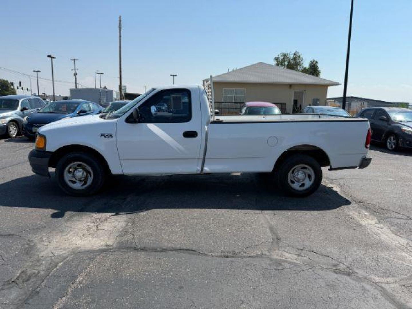 2004 Oxford White /Medium Graphite Ford F-150 Heritage (2FTRF17214C) with an 42L V-6 regular unleaded engine, Automatic transmission, located at 1175 N Woodruff Ave, Idaho Falls, ID, 83401, 43.506901, -111.999657 - At Timberline Auto, finding a great deal on your next vehicle is always easy! Our experienced sales staff's goal is to help find you the right vehicle at the right price! Our knowledgeable finance department has options for almost any credit score. We offer extended service contract options to prote - Photo#2