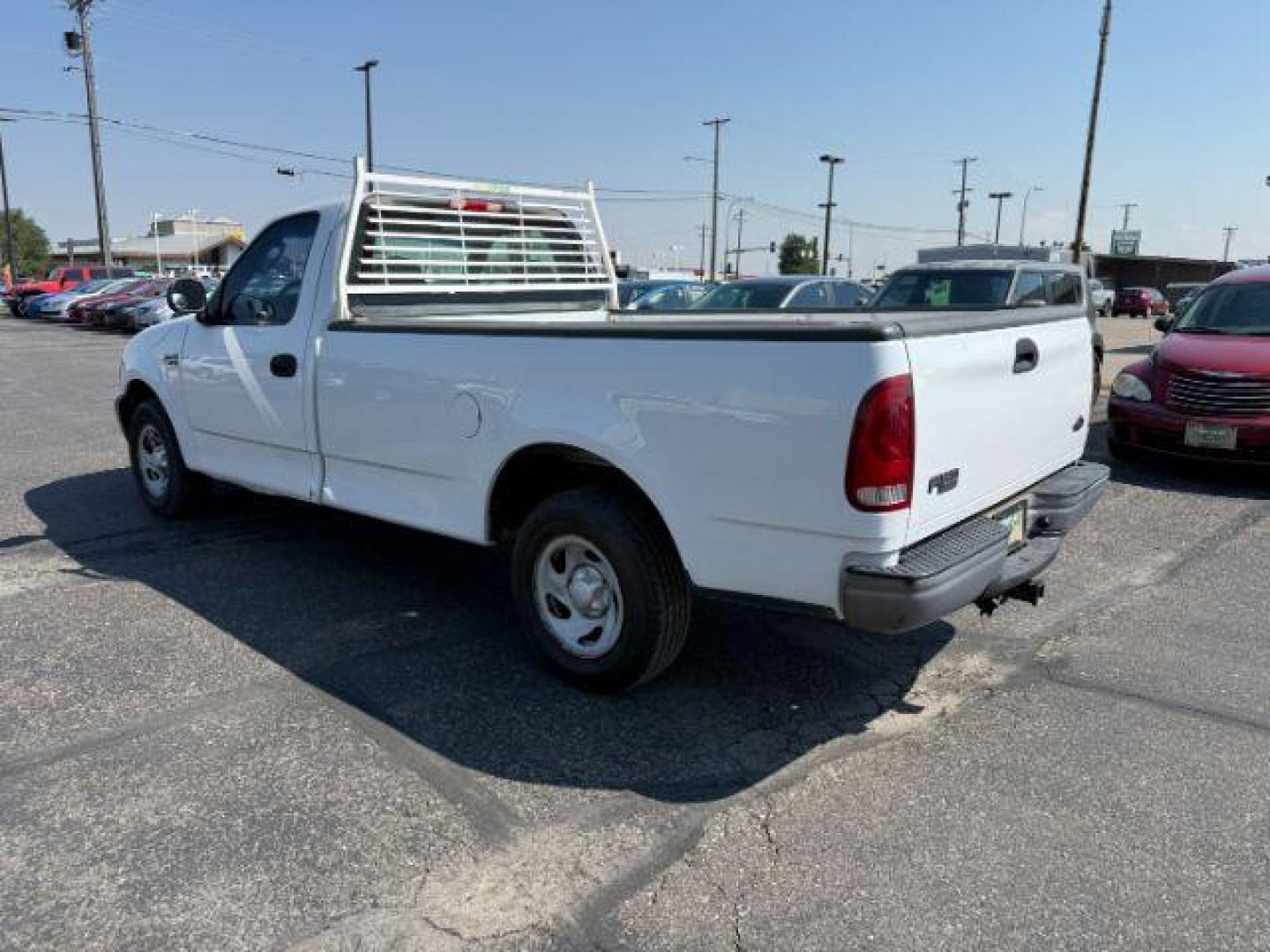 2004 Oxford White /Medium Graphite Ford F-150 Heritage (2FTRF17214C) with an 42L V-6 regular unleaded engine, Automatic transmission, located at 1175 N Woodruff Ave, Idaho Falls, ID, 83401, 43.506901, -111.999657 - At Timberline Auto, finding a great deal on your next vehicle is always easy! Our experienced sales staff's goal is to help find you the right vehicle at the right price! Our knowledgeable finance department has options for almost any credit score. We offer extended service contract options to prote - Photo#3