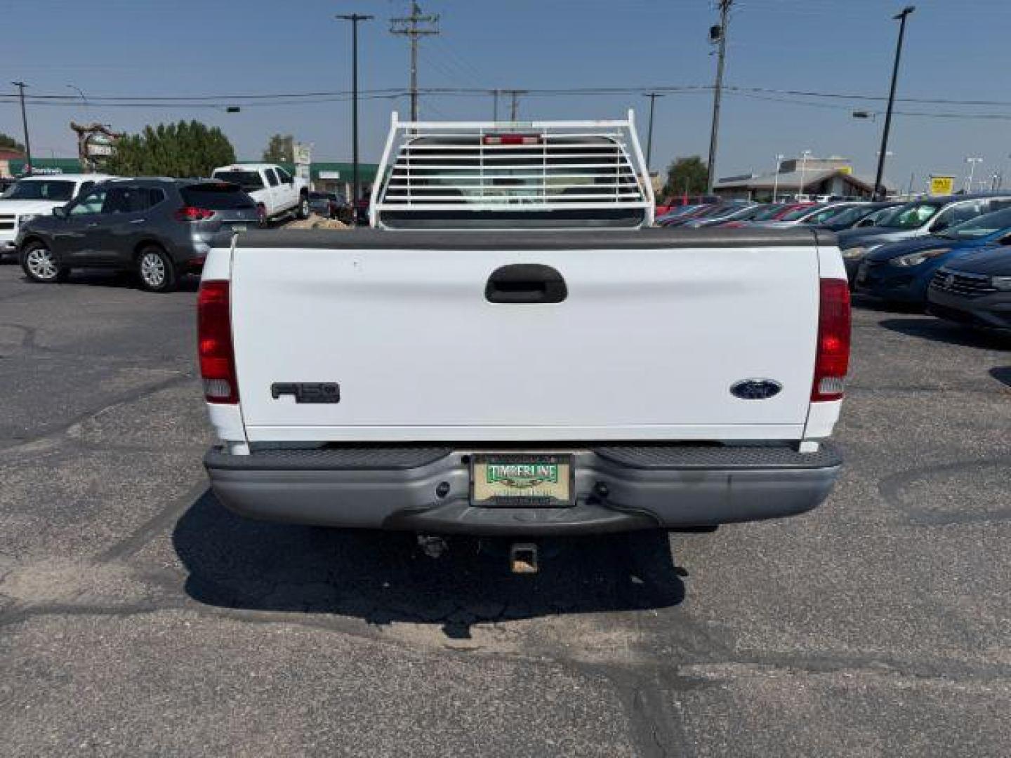 2004 Oxford White /Medium Graphite Ford F-150 Heritage (2FTRF17214C) with an 42L V-6 regular unleaded engine, Automatic transmission, located at 1175 N Woodruff Ave, Idaho Falls, ID, 83401, 43.506901, -111.999657 - At Timberline Auto, finding a great deal on your next vehicle is always easy! Our experienced sales staff's goal is to help find you the right vehicle at the right price! Our knowledgeable finance department has options for almost any credit score. We offer extended service contract options to prote - Photo#4