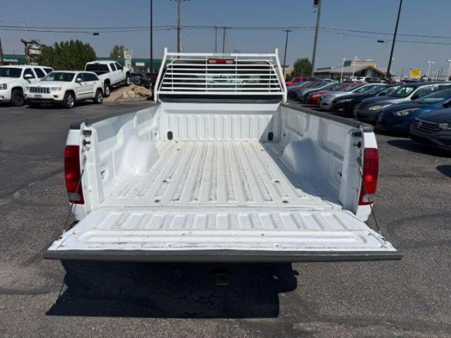 2004 Oxford White /Medium Graphite Ford F-150 Heritage (2FTRF17214C) with an 42L V-6 regular unleaded engine, Automatic transmission, located at 1175 N Woodruff Ave, Idaho Falls, ID, 83401, 43.506901, -111.999657 - At Timberline Auto, finding a great deal on your next vehicle is always easy! Our experienced sales staff's goal is to help find you the right vehicle at the right price! Our knowledgeable finance department has options for almost any credit score. We offer extended service contract options to prote - Photo#5