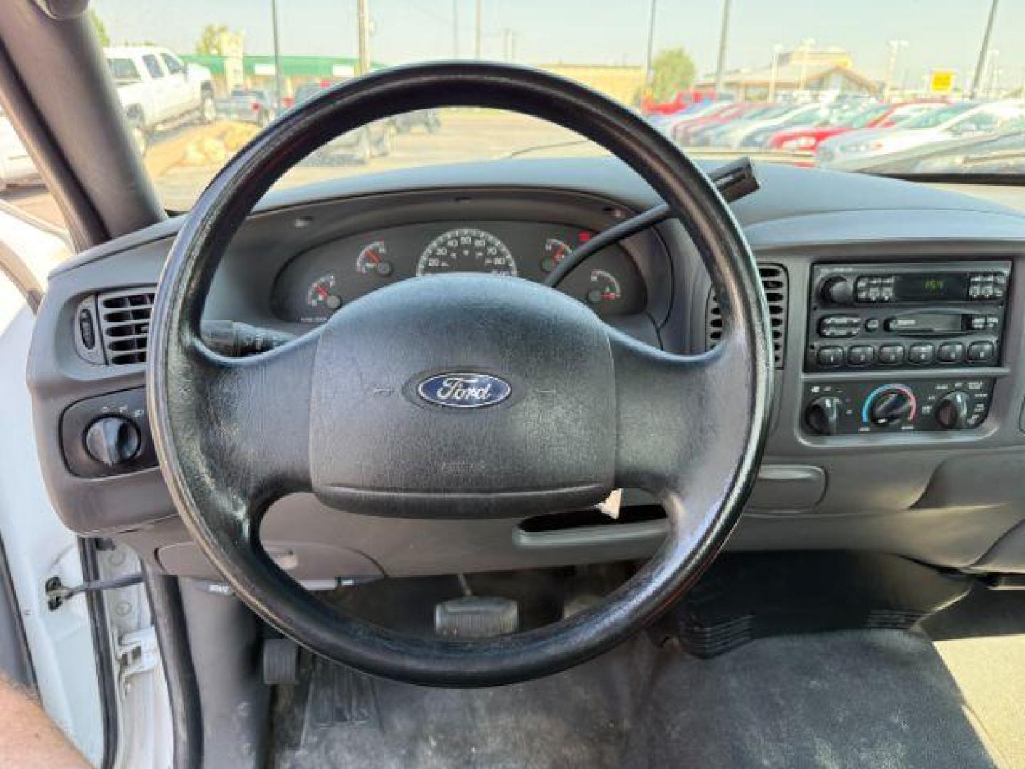 2004 Oxford White /Medium Graphite Ford F-150 Heritage (2FTRF17214C) with an 42L V-6 regular unleaded engine, Automatic transmission, located at 1175 N Woodruff Ave, Idaho Falls, ID, 83401, 43.506901, -111.999657 - At Timberline Auto, finding a great deal on your next vehicle is always easy! Our experienced sales staff's goal is to help find you the right vehicle at the right price! Our knowledgeable finance department has options for almost any credit score. We offer extended service contract options to prote - Photo#13