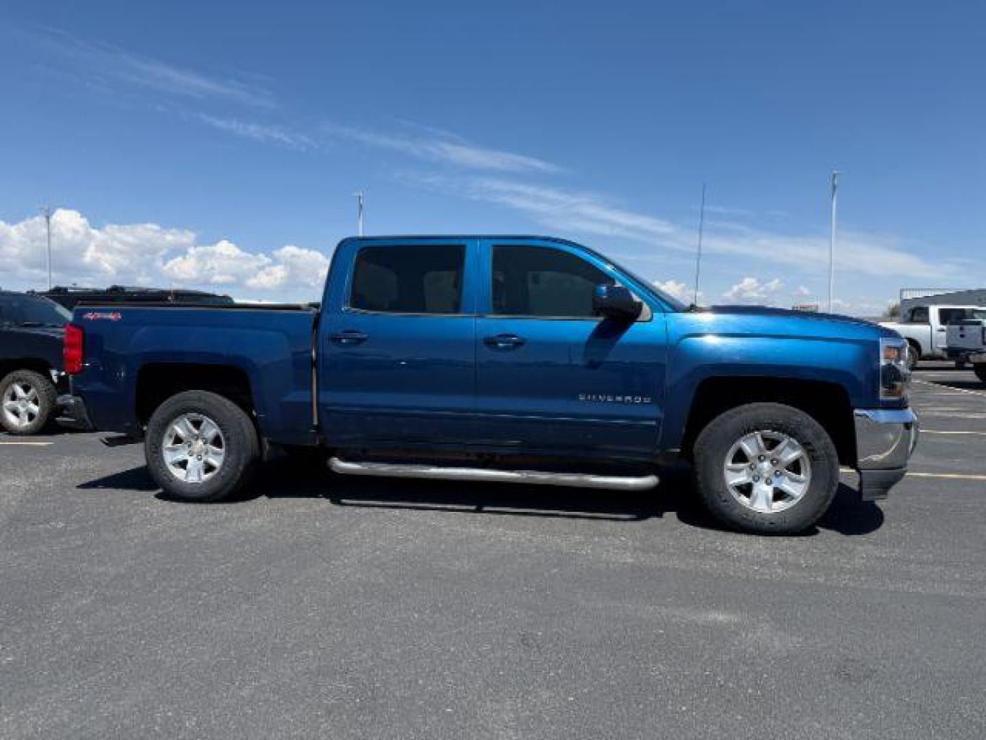 2017 BLUE /Jet Black Chevrolet Silverado 1500 1LT (3GCUKREC7HG) with an 5.3 engine, AUTOMATIC transmission, located at 1235 N Woodruff Ave., Idaho Falls, 83401, (208) 523-1053, 43.507172, -112.000488 - At Timberline Auto, finding a great deal on your next vehicle is always easy! Our experienced sales staff's goal is to help find you the right vehicle at the right price! Our knowledgeable finance department has options for almost any credit score. We offer extended service contract options to prote - Photo#0