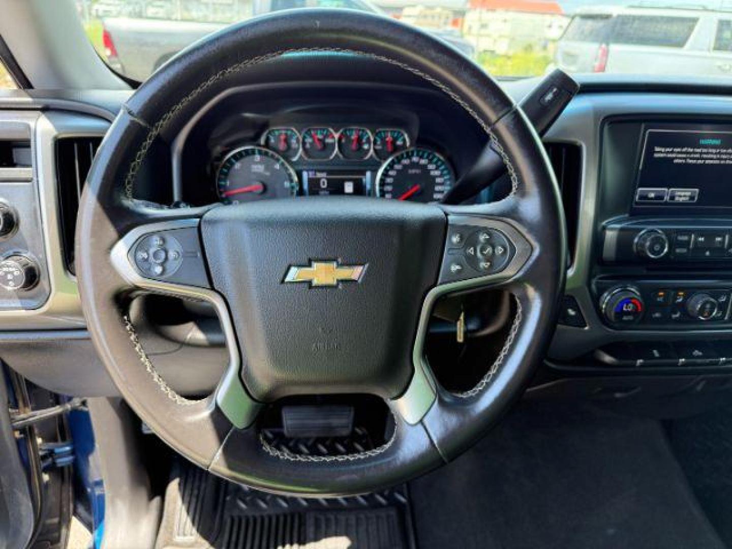 2017 BLUE /Jet Black Chevrolet Silverado 1500 1LT (3GCUKREC7HG) with an 5.3 engine, AUTOMATIC transmission, located at 1235 N Woodruff Ave., Idaho Falls, 83401, (208) 523-1053, 43.507172, -112.000488 - At Timberline Auto, finding a great deal on your next vehicle is always easy! Our experienced sales staff's goal is to help find you the right vehicle at the right price! Our knowledgeable finance department has options for almost any credit score. We offer extended service contract options to prote - Photo#35