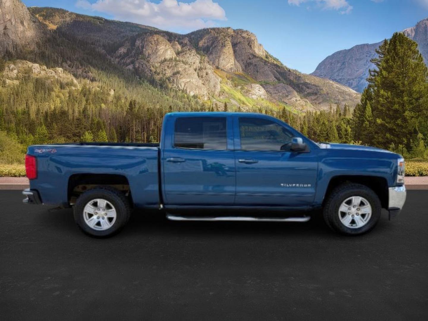 2017 BLUE /Jet Black Chevrolet Silverado 1500 1LT (3GCUKREC7HG) with an 5.3 engine, AUTOMATIC transmission, located at 1235 N Woodruff Ave., Idaho Falls, 83401, (208) 523-1053, 43.507172, -112.000488 - At Timberline Auto, finding a great deal on your next vehicle is always easy! Our experienced sales staff's goal is to help find you the right vehicle at the right price! Our knowledgeable finance department has options for almost any credit score. We offer extended service contract options to prote - Photo#7