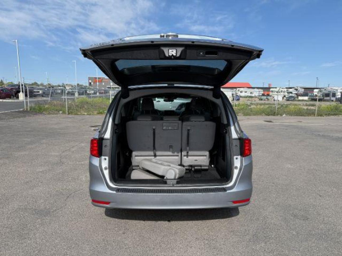 2019 Lunar Silver Metallic /Gray Honda Odyssey EX-L (5FNRL6H79KB) with an 3.5L V-6 gasoline direct injection engine, AUTOMATIC transmission, located at 1235 N Woodruff Ave., Idaho Falls, 83401, (208) 523-1053, 43.507172, -112.000488 - At Timberline Auto, finding a great deal on your next vehicle is always easy! Our experienced sales staff's goal is to help find you the right vehicle at the right price! Our knowledgeable finance department has options for almost any credit score. We offer extended service contract options to prote - Photo#5