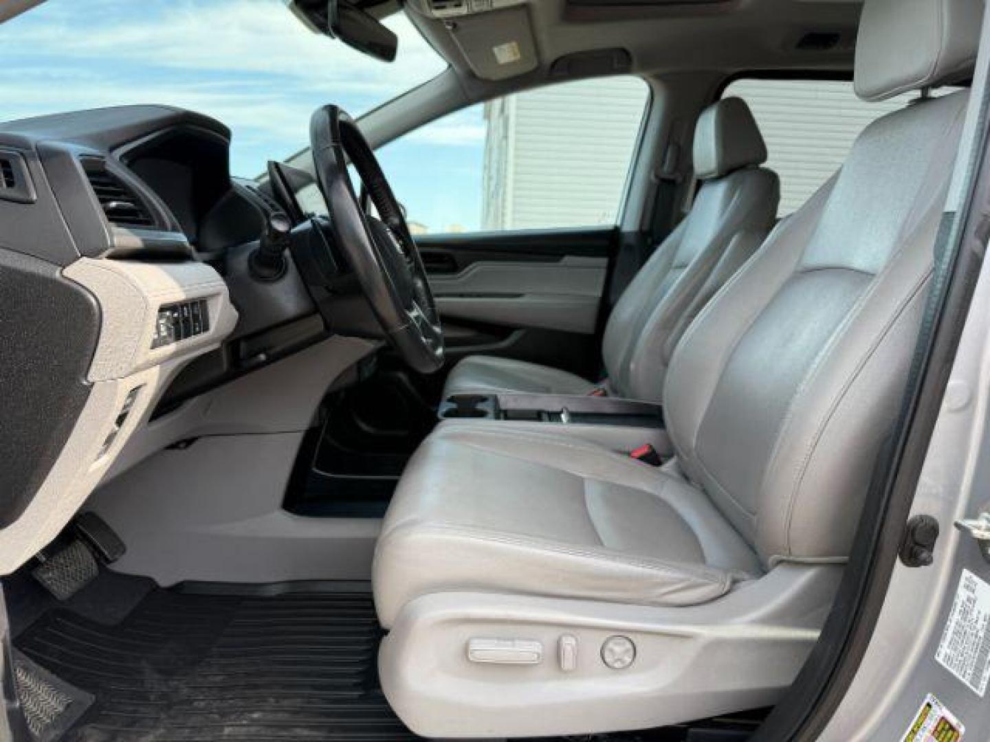 2019 Lunar Silver Metallic /Gray Honda Odyssey EX-L (5FNRL6H79KB) with an 3.5L V-6 gasoline direct injection engine, AUTOMATIC transmission, located at 1235 N Woodruff Ave., Idaho Falls, 83401, (208) 523-1053, 43.507172, -112.000488 - At Timberline Auto, finding a great deal on your next vehicle is always easy! Our experienced sales staff's goal is to help find you the right vehicle at the right price! Our knowledgeable finance department has options for almost any credit score. We offer extended service contract options to prote - Photo#12