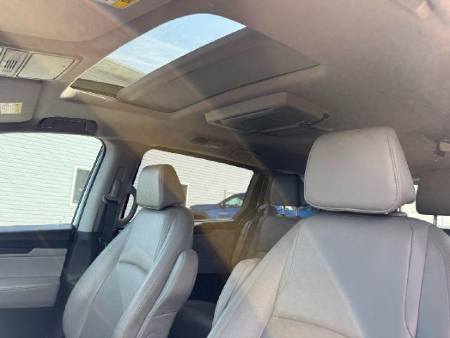 2019 Lunar Silver Metallic /Gray Honda Odyssey EX-L (5FNRL6H79KB) with an 3.5L V-6 gasoline direct injection engine, AUTOMATIC transmission, located at 1235 N Woodruff Ave., Idaho Falls, 83401, (208) 523-1053, 43.507172, -112.000488 - At Timberline Auto, finding a great deal on your next vehicle is always easy! Our experienced sales staff's goal is to help find you the right vehicle at the right price! Our knowledgeable finance department has options for almost any credit score. We offer extended service contract options to prote - Photo#18