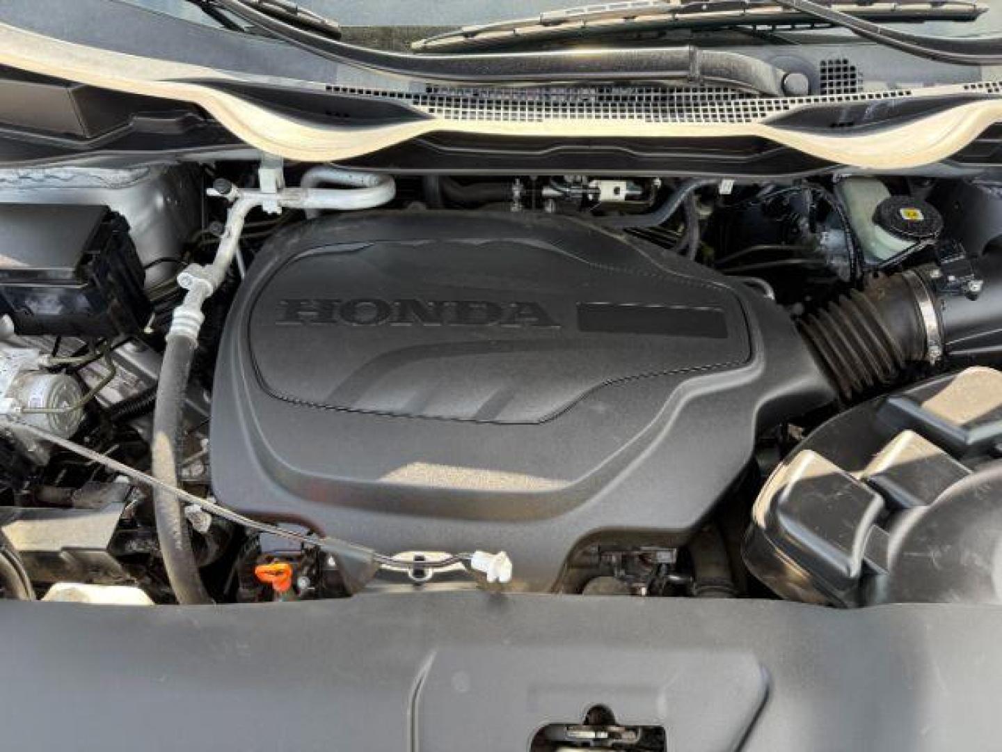 2019 Lunar Silver Metallic /Gray Honda Odyssey EX-L (5FNRL6H79KB) with an 3.5L V-6 gasoline direct injection engine, AUTOMATIC transmission, located at 1235 N Woodruff Ave., Idaho Falls, 83401, (208) 523-1053, 43.507172, -112.000488 - At Timberline Auto, finding a great deal on your next vehicle is always easy! Our experienced sales staff's goal is to help find you the right vehicle at the right price! Our knowledgeable finance department has options for almost any credit score. We offer extended service contract options to prote - Photo#23