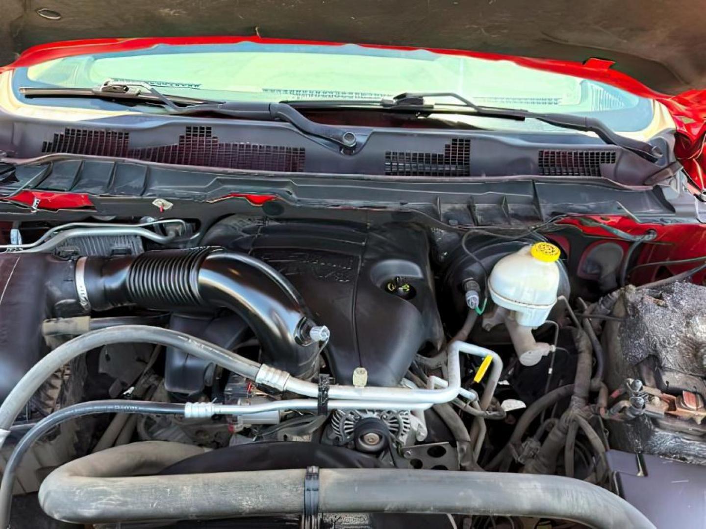2016 Bright Red /Diesel Gray/Black Ram 1500 Big Horn (3C6RR7LT7GG) with an HEMI 5.7L V-8 variable valve control engine, AUTOMATIC transmission, located at 1235 N Woodruff Ave., Idaho Falls, 83401, (208) 523-1053, 43.507172, -112.000488 - At Timberline Auto, finding a great deal on your next vehicle is always easy! Our experienced sales staff's goal is to help find you the right vehicle at the right price! Our knowledgeable finance department has options for almost any credit score. We offer extended service contract options to prote - Photo#23