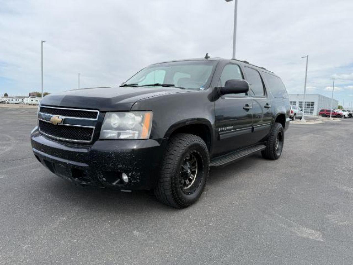 2010 Black /Ebony Chevrolet Suburban 1500 LT1 (1GNUKJE38AR) with an Vortec 5.3L V-8 variable valve control engine, AUTOMATIC transmission, located at 1235 N Woodruff Ave., Idaho Falls, 83401, (208) 523-1053, 43.507172, -112.000488 - At Timberline Auto, finding a great deal on your next vehicle is always easy! Our experienced sales staff's goal is to help find you the right vehicle at the right price! Our knowledgeable finance department has options for almost any credit score. We offer extended service contract options to prote - Photo#0