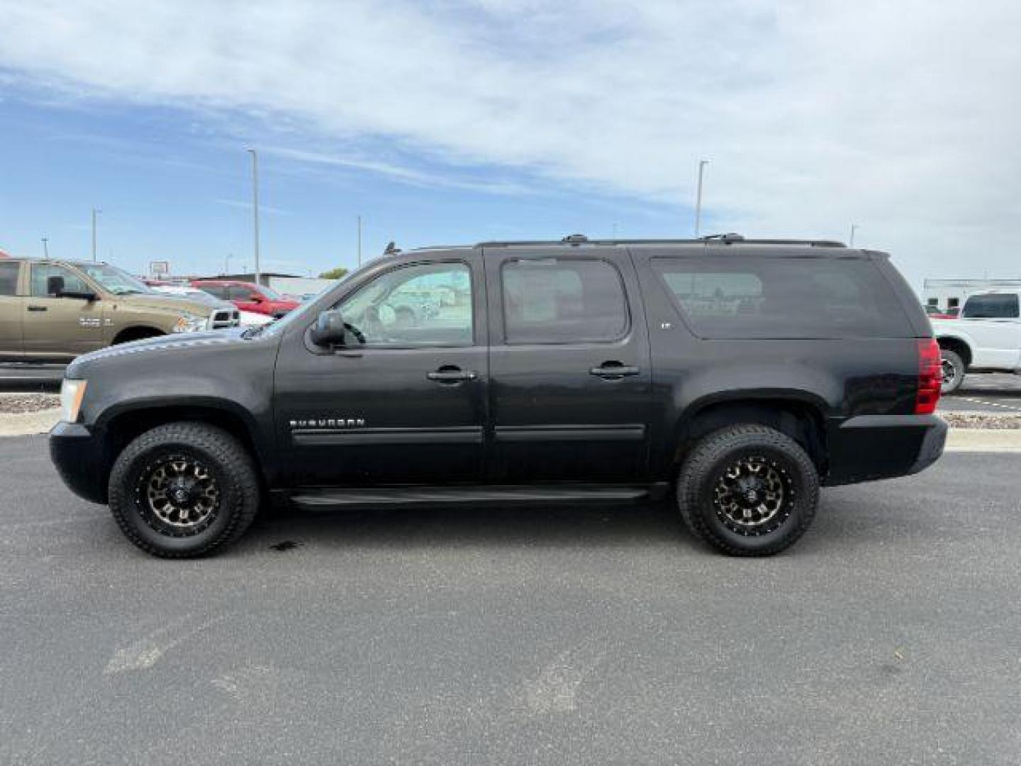 2010 Black /Ebony Chevrolet Suburban 1500 LT1 (1GNUKJE38AR) with an Vortec 5.3L V-8 variable valve control engine, AUTOMATIC transmission, located at 1235 N Woodruff Ave., Idaho Falls, 83401, (208) 523-1053, 43.507172, -112.000488 - At Timberline Auto, finding a great deal on your next vehicle is always easy! Our experienced sales staff's goal is to help find you the right vehicle at the right price! Our knowledgeable finance department has options for almost any credit score. We offer extended service contract options to prote - Photo#1