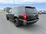 2010 Black /Ebony Chevrolet Suburban 1500 LT1 (1GNUKJE38AR) with an Vortec 5.3L V-8 variable valve control engine, AUTOMATIC transmission, located at 1235 N Woodruff Ave., Idaho Falls, 83401, (208) 523-1053, 43.507172, -112.000488 - At Timberline Auto, finding a great deal on your next vehicle is always easy! Our experienced sales staff's goal is to help find you the right vehicle at the right price! Our knowledgeable finance department has options for almost any credit score. We offer extended service contract options to prote - Photo#2