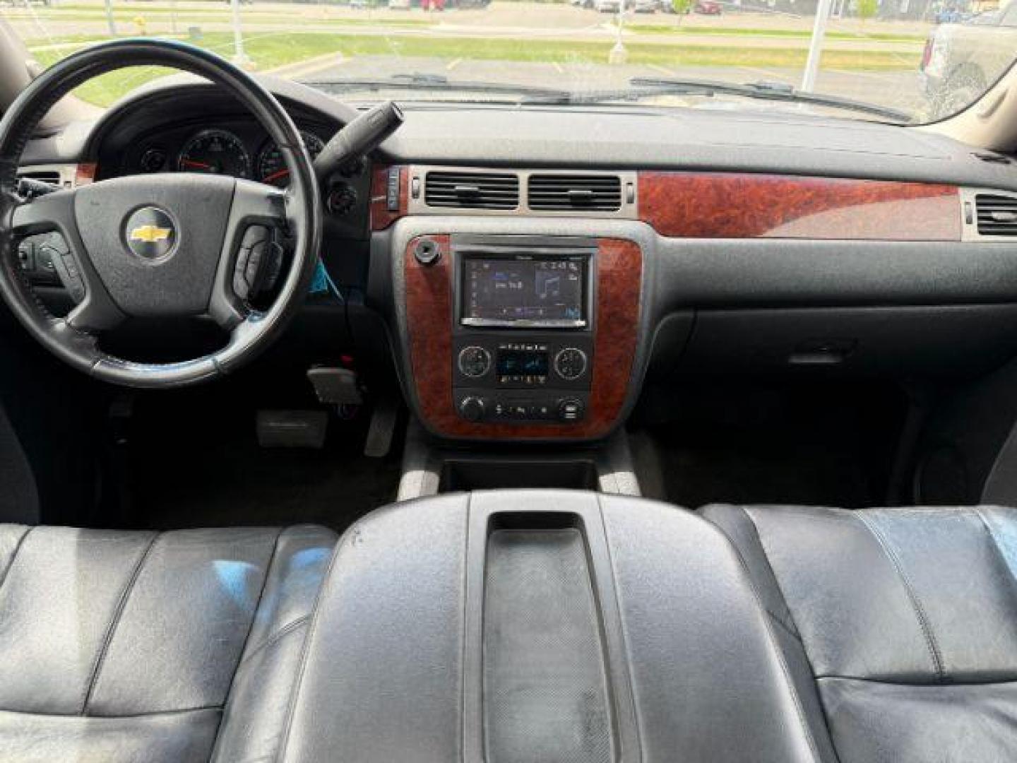 2010 Black /Ebony Chevrolet Suburban 1500 LT1 (1GNUKJE38AR) with an Vortec 5.3L V-8 variable valve control engine, AUTOMATIC transmission, located at 1235 N Woodruff Ave., Idaho Falls, 83401, (208) 523-1053, 43.507172, -112.000488 - At Timberline Auto, finding a great deal on your next vehicle is always easy! Our experienced sales staff's goal is to help find you the right vehicle at the right price! Our knowledgeable finance department has options for almost any credit score. We offer extended service contract options to prote - Photo#19