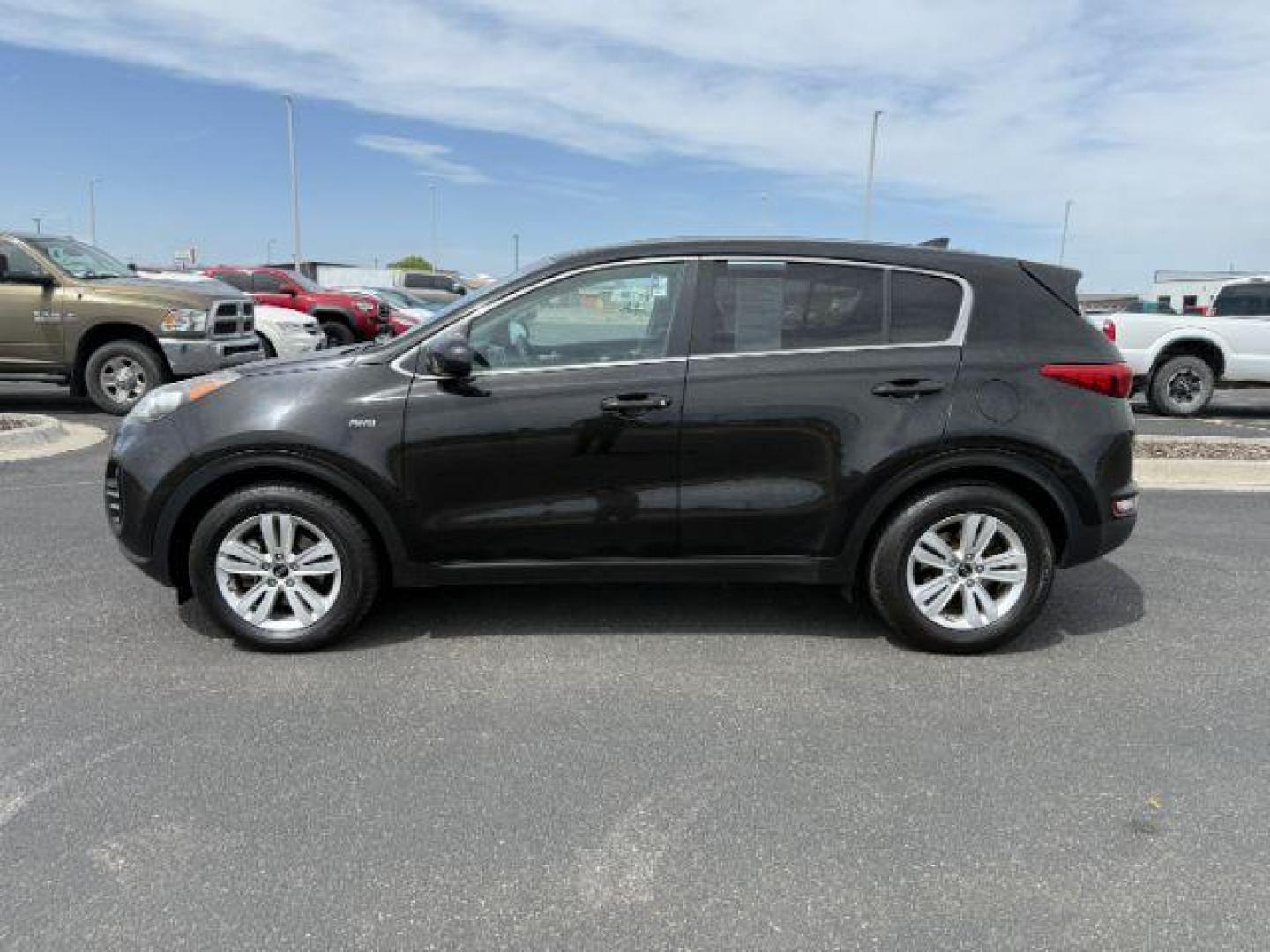 2018 BLACK /Black Kia Sportage LX (KNDPMCAC6J7) with an Theta II 2.4L I-4 gasoline direct injection engine, AUTOMATIC transmission, located at 1235 N Woodruff Ave., Idaho Falls, 83401, (208) 523-1053, 43.507172, -112.000488 - At Timberline Auto, finding a great deal on your next vehicle is always easy! Our experienced sales staff's goal is to help find you the right vehicle at the right price! Our knowledgeable finance department has options for almost any credit score. We offer extended service contract options to prote - Photo#0