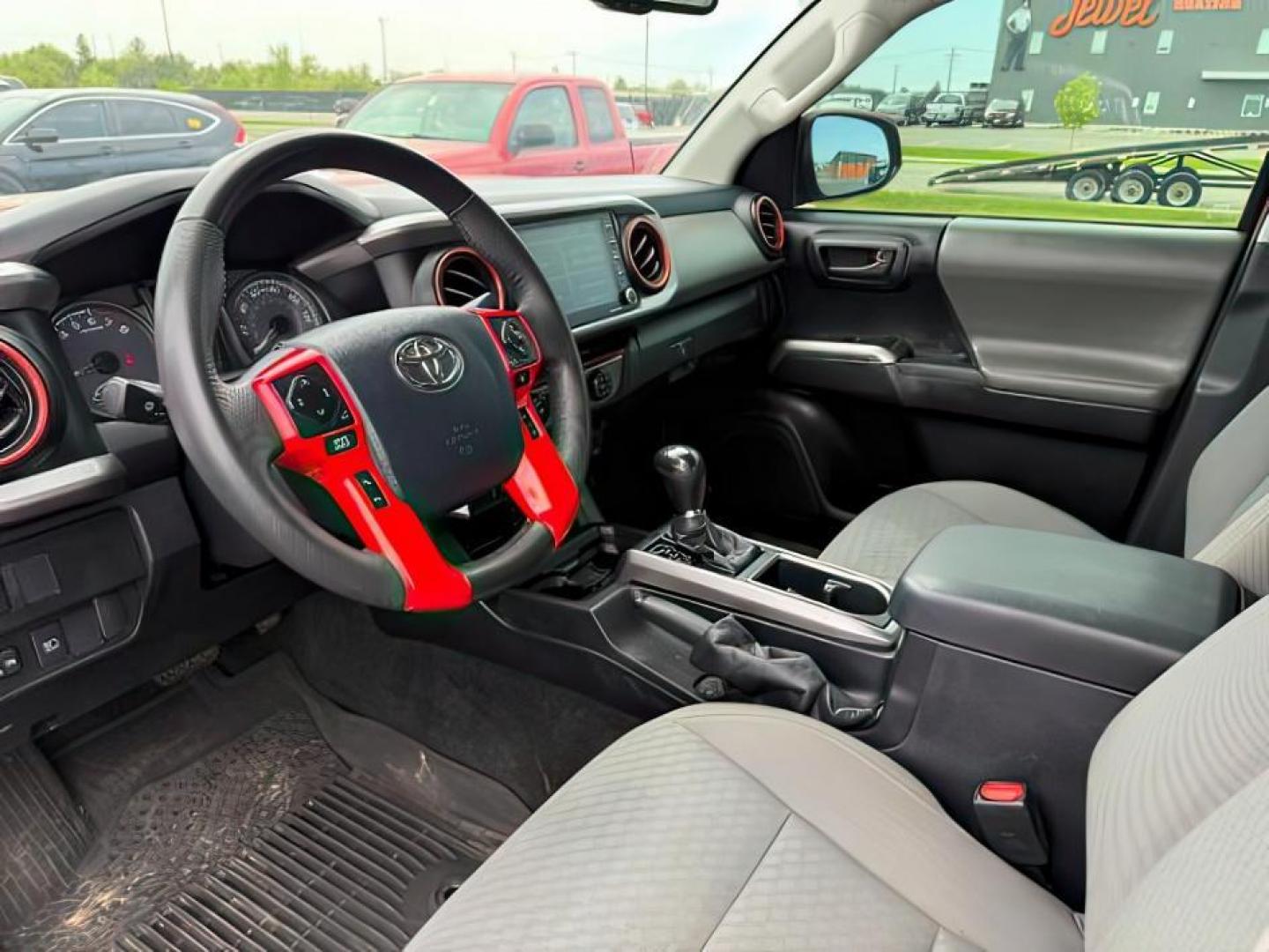 2020 Barcelona Red Metallic /Cement Toyota Tacoma SR5 V6 (3TMDZ5BN1LM) with an 3.5L V-6 port/direct injection engine, AUTOMATIC transmission, located at 1235 N Woodruff Ave., Idaho Falls, 83401, (208) 523-1053, 43.507172, -112.000488 - At Timberline Auto, finding a great deal on your next vehicle is always easy! Our experienced sales staff's goal is to help find you the right vehicle at the right price! Our knowledgeable finance department has options for almost any credit score. We offer extended service contract options to prote - Photo#12