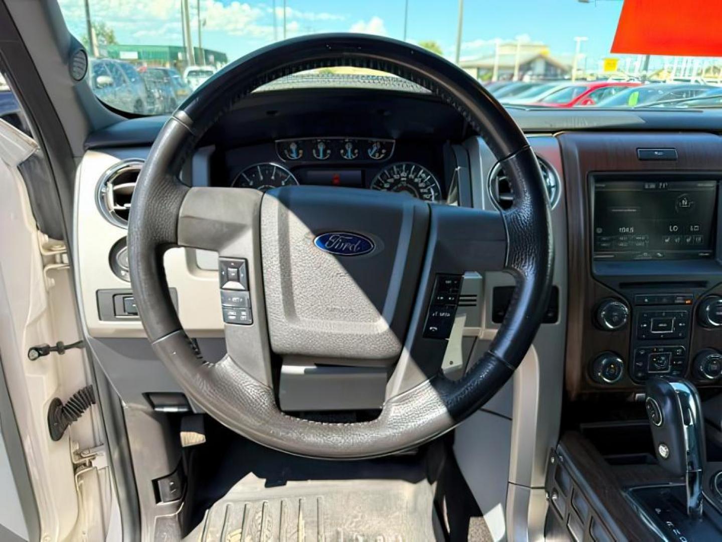 2013 Oxford White /Black Ford F-150 (1FTFW1ET3DK) with an EcoBoost 35L V-6 gasoline direct injection engine, Automatic transmission, located at 1175 N Woodruff Ave, Idaho Falls, ID, 83401, 43.506901, -111.999657 - At Timberline Auto, finding a great deal on your next vehicle is always easy! Our experienced sales staff's goal is to help find you the right vehicle at the right price! Our knowledgeable finance department has options for almost any credit score. We offer extended service contract options to prote - Photo#13