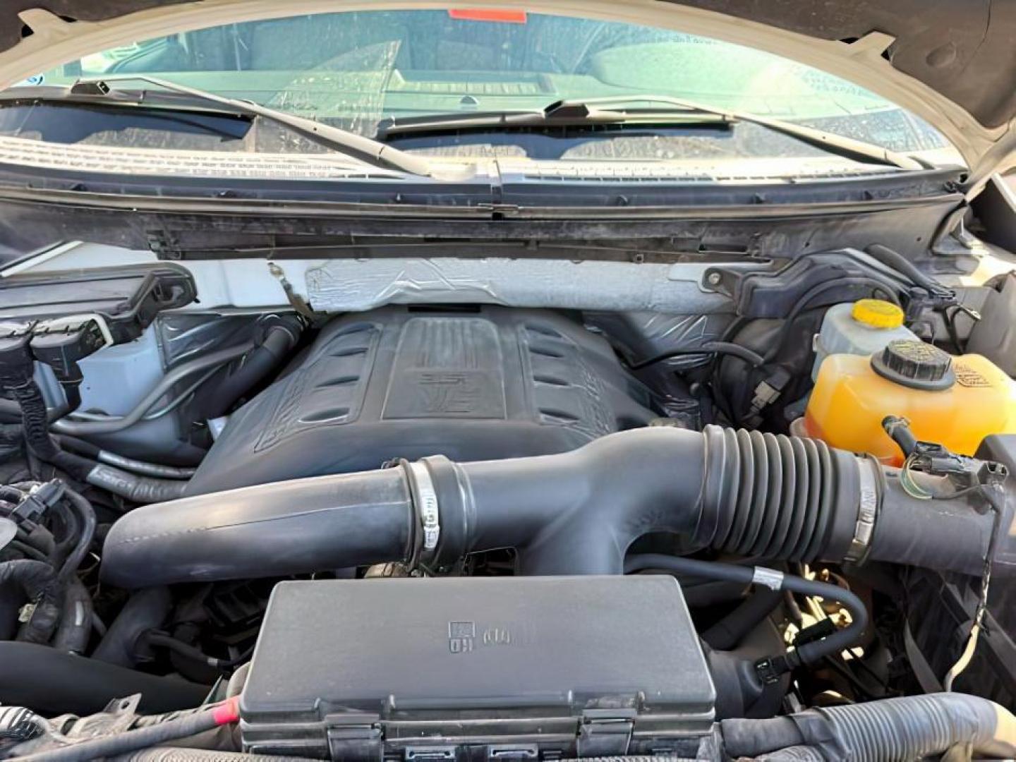 2013 Oxford White /Black Ford F-150 (1FTFW1ET3DK) with an EcoBoost 35L V-6 gasoline direct injection engine, Automatic transmission, located at 1175 N Woodruff Ave, Idaho Falls, ID, 83401, 43.506901, -111.999657 - At Timberline Auto, finding a great deal on your next vehicle is always easy! Our experienced sales staff's goal is to help find you the right vehicle at the right price! Our knowledgeable finance department has options for almost any credit score. We offer extended service contract options to prote - Photo#19