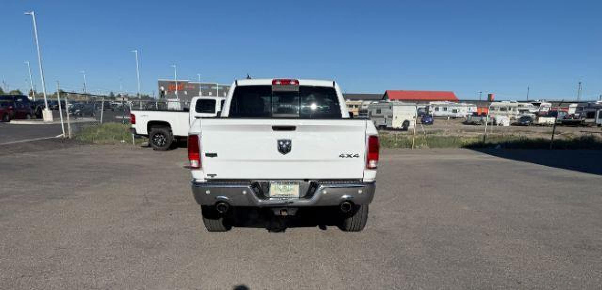 2017 Bright White Clearcoat /Black Ram 1500 Laramie Crew Cab 4x4 5'7 Box (1C6RR7NTXHS) with an HEMI 5.7L V-8 variable valve control engine, AUTOMATIC transmission, located at 1235 N Woodruff Ave., Idaho Falls, 83401, (208) 523-1053, 43.507172, -112.000488 - At Timberline Auto, finding a great deal on your next vehicle is always easy! Our experienced sales staff's goal is to help find you the right vehicle at the right price! Our knowledgeable finance department has options for almost any credit score. We offer extended service contract options to prote - Photo#3