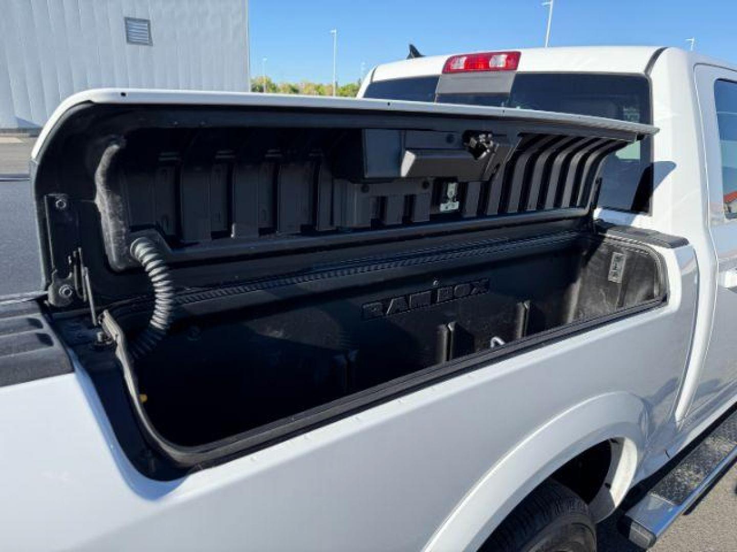 2017 Bright White Clearcoat /Black Ram 1500 Laramie Crew Cab 4x4 5'7 Box (1C6RR7NTXHS) with an HEMI 5.7L V-8 variable valve control engine, AUTOMATIC transmission, located at 1235 N Woodruff Ave., Idaho Falls, 83401, (208) 523-1053, 43.507172, -112.000488 - At Timberline Auto, finding a great deal on your next vehicle is always easy! Our experienced sales staff's goal is to help find you the right vehicle at the right price! Our knowledgeable finance department has options for almost any credit score. We offer extended service contract options to prote - Photo#7