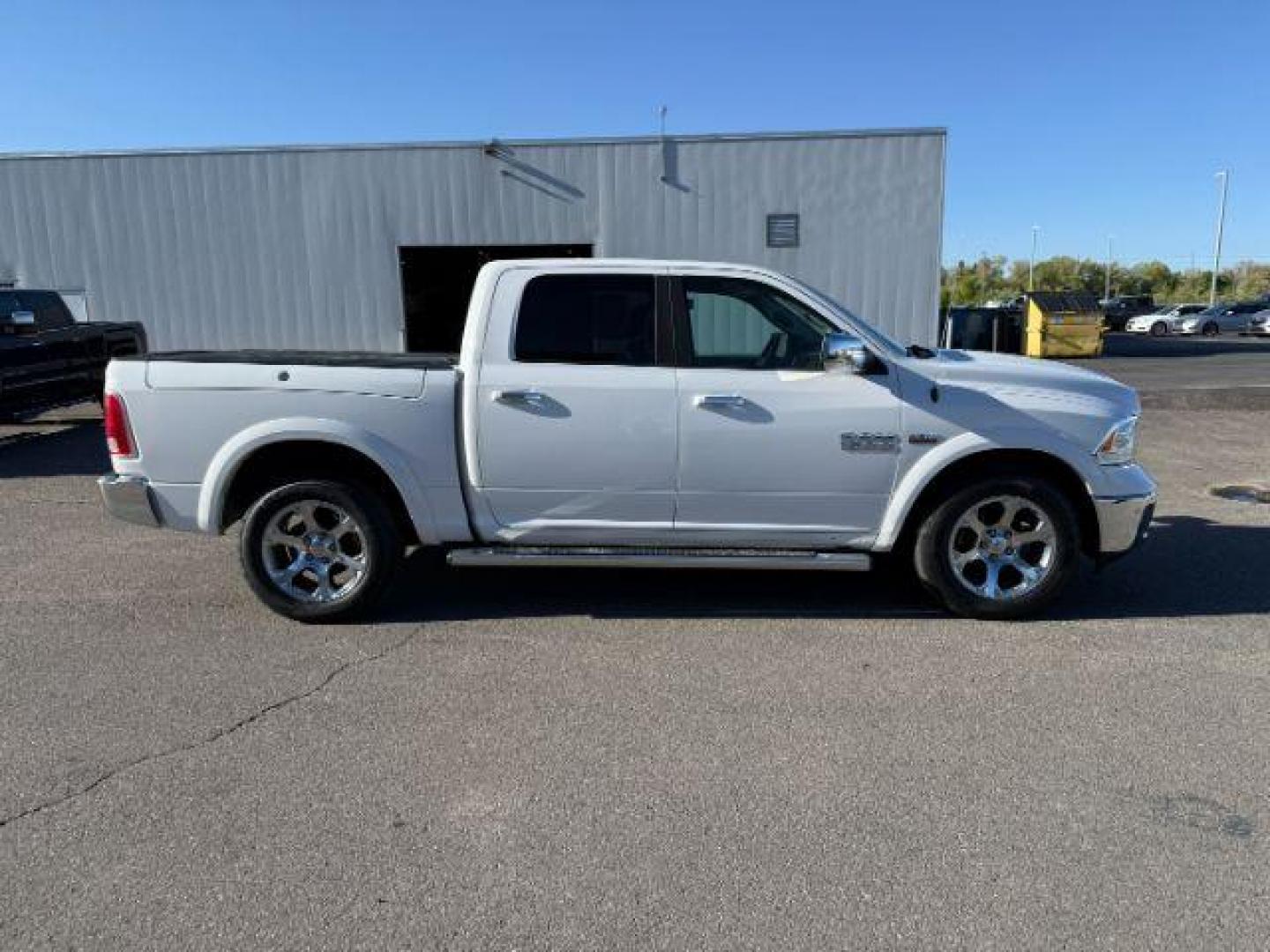2017 Bright White Clearcoat /Black Ram 1500 Laramie Crew Cab 4x4 5'7 Box (1C6RR7NTXHS) with an HEMI 5.7L V-8 variable valve control engine, AUTOMATIC transmission, located at 1235 N Woodruff Ave., Idaho Falls, 83401, (208) 523-1053, 43.507172, -112.000488 - At Timberline Auto, finding a great deal on your next vehicle is always easy! Our experienced sales staff's goal is to help find you the right vehicle at the right price! Our knowledgeable finance department has options for almost any credit score. We offer extended service contract options to prote - Photo#8