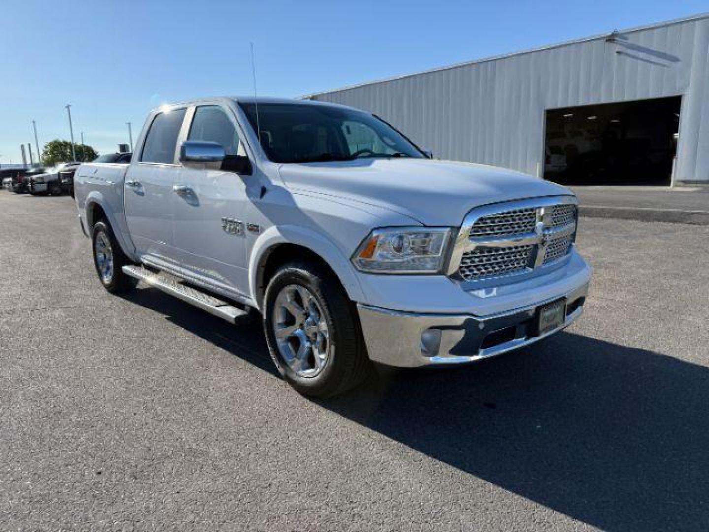 2017 Bright White Clearcoat /Black Ram 1500 Laramie Crew Cab 4x4 5'7 Box (1C6RR7NTXHS) with an HEMI 5.7L V-8 variable valve control engine, AUTOMATIC transmission, located at 1235 N Woodruff Ave., Idaho Falls, 83401, (208) 523-1053, 43.507172, -112.000488 - At Timberline Auto, finding a great deal on your next vehicle is always easy! Our experienced sales staff's goal is to help find you the right vehicle at the right price! Our knowledgeable finance department has options for almost any credit score. We offer extended service contract options to prote - Photo#9