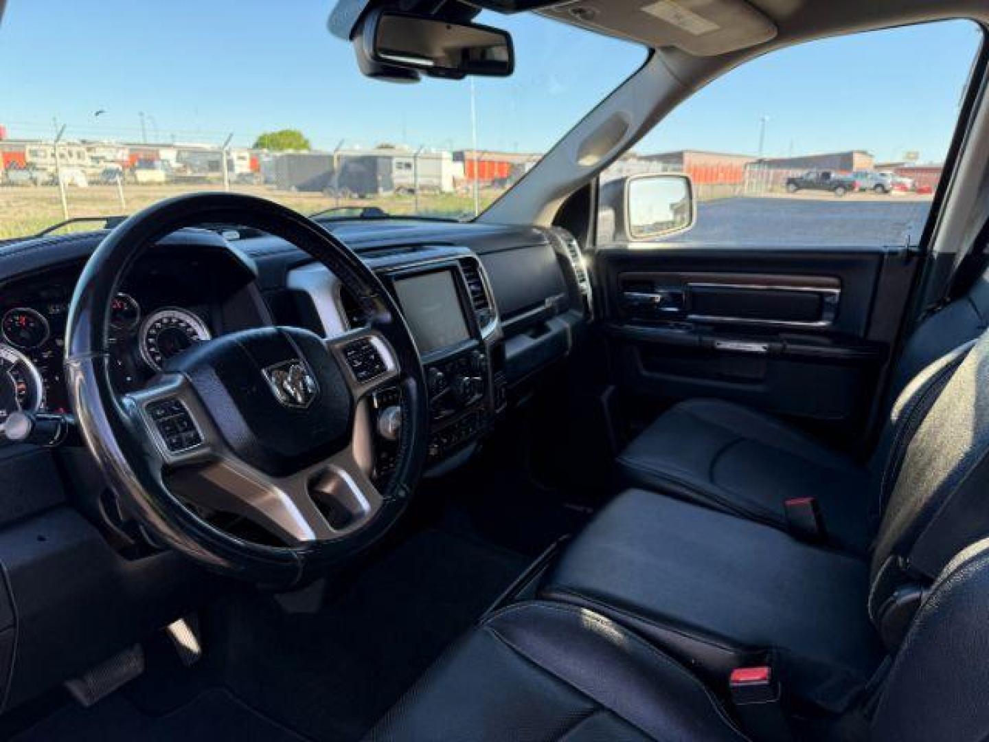 2017 Bright White Clearcoat /Black Ram 1500 Laramie Crew Cab 4x4 5'7 Box (1C6RR7NTXHS) with an HEMI 5.7L V-8 variable valve control engine, AUTOMATIC transmission, located at 1235 N Woodruff Ave., Idaho Falls, 83401, (208) 523-1053, 43.507172, -112.000488 - At Timberline Auto, finding a great deal on your next vehicle is always easy! Our experienced sales staff's goal is to help find you the right vehicle at the right price! Our knowledgeable finance department has options for almost any credit score. We offer extended service contract options to prote - Photo#13