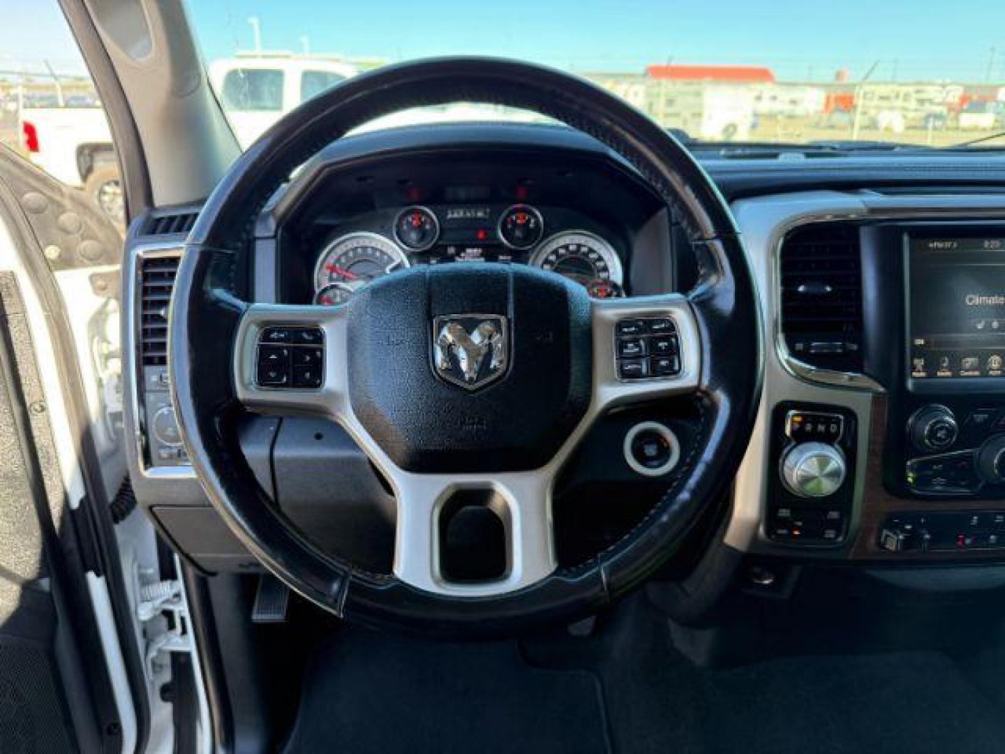 2017 Bright White Clearcoat /Black Ram 1500 Laramie Crew Cab 4x4 5'7 Box (1C6RR7NTXHS) with an HEMI 5.7L V-8 variable valve control engine, AUTOMATIC transmission, located at 1235 N Woodruff Ave., Idaho Falls, 83401, (208) 523-1053, 43.507172, -112.000488 - At Timberline Auto, finding a great deal on your next vehicle is always easy! Our experienced sales staff's goal is to help find you the right vehicle at the right price! Our knowledgeable finance department has options for almost any credit score. We offer extended service contract options to prote - Photo#14
