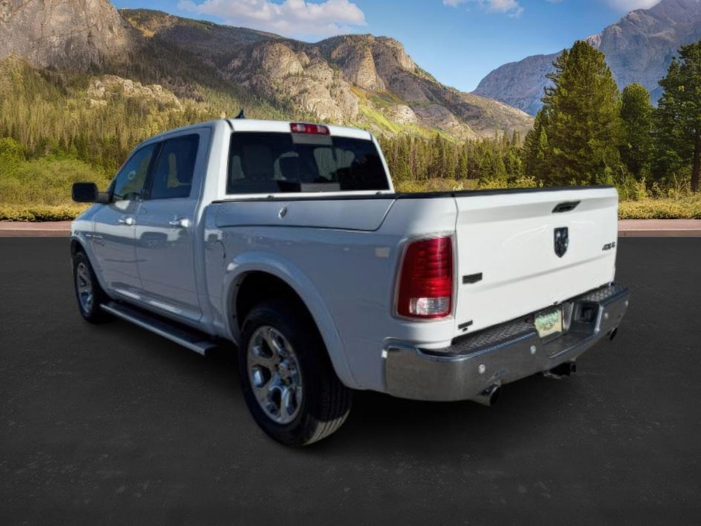 2017 Bright White Clearcoat /Black Ram 1500 Laramie Crew Cab 4x4 5'7 Box (1C6RR7NTXHS) with an HEMI 5.7L V-8 variable valve control engine, AUTOMATIC transmission, located at 1235 N Woodruff Ave., Idaho Falls, 83401, (208) 523-1053, 43.507172, -112.000488 - At Timberline Auto, finding a great deal on your next vehicle is always easy! Our experienced sales staff's goal is to help find you the right vehicle at the right price! Our knowledgeable finance department has options for almost any credit score. We offer extended service contract options to prote - Photo#2