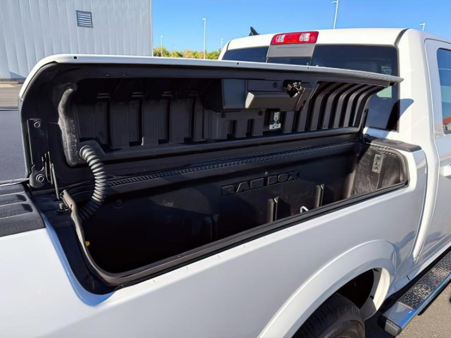 2017 Bright White Clearcoat /Black Ram 1500 Laramie Crew Cab 4x4 5'7 Box (1C6RR7NTXHS) with an HEMI 5.7L V-8 variable valve control engine, AUTOMATIC transmission, located at 1235 N Woodruff Ave., Idaho Falls, 83401, (208) 523-1053, 43.507172, -112.000488 - At Timberline Auto, finding a great deal on your next vehicle is always easy! Our experienced sales staff's goal is to help find you the right vehicle at the right price! Our knowledgeable finance department has options for almost any credit score. We offer extended service contract options to prote - Photo#6