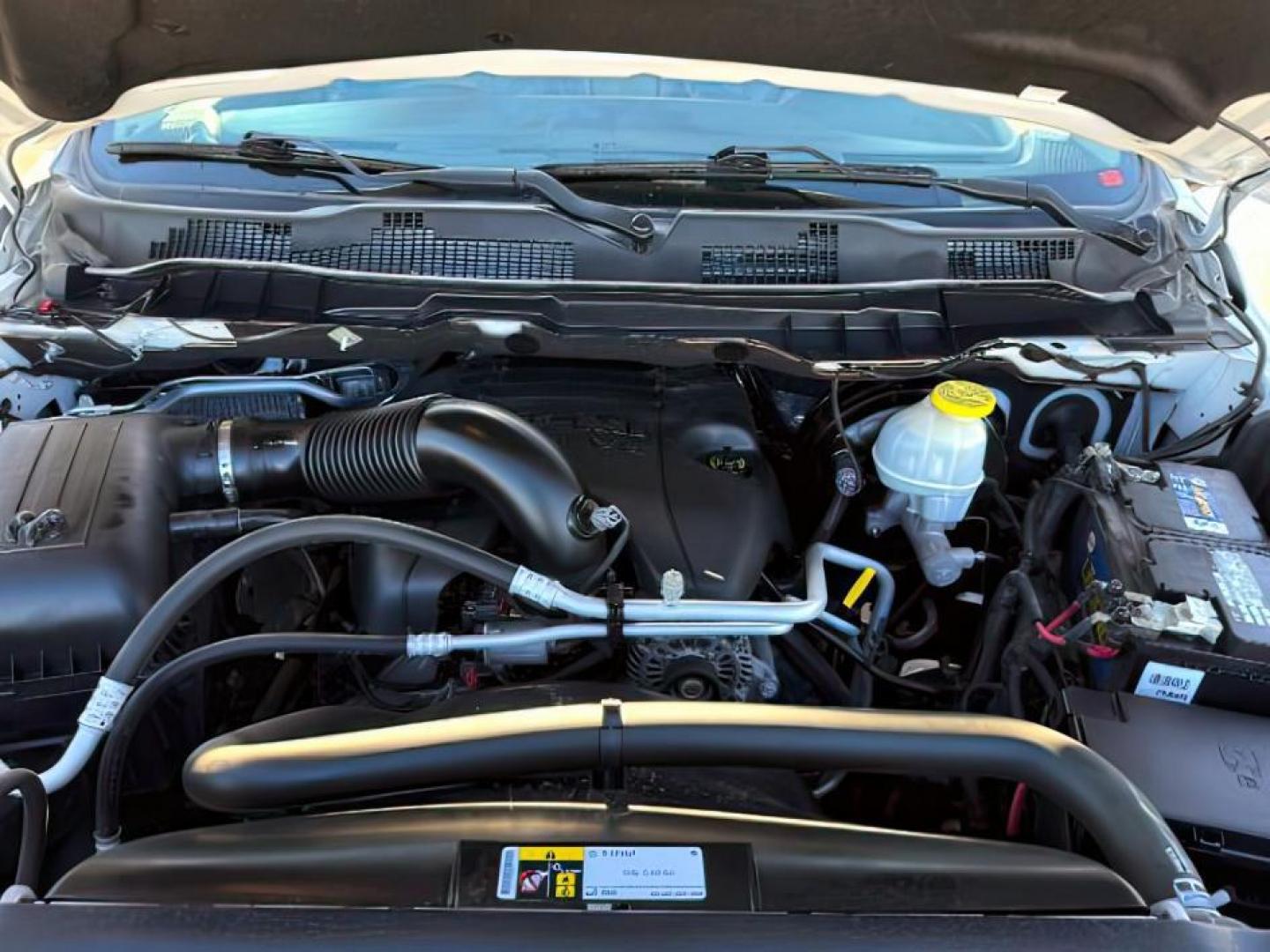 2017 Bright White Clearcoat /Black Ram 1500 Laramie Crew Cab 4x4 5'7 Box (1C6RR7NTXHS) with an HEMI 5.7L V-8 variable valve control engine, AUTOMATIC transmission, located at 1235 N Woodruff Ave., Idaho Falls, 83401, (208) 523-1053, 43.507172, -112.000488 - At Timberline Auto, finding a great deal on your next vehicle is always easy! Our experienced sales staff's goal is to help find you the right vehicle at the right price! Our knowledgeable finance department has options for almost any credit score. We offer extended service contract options to prote - Photo#23