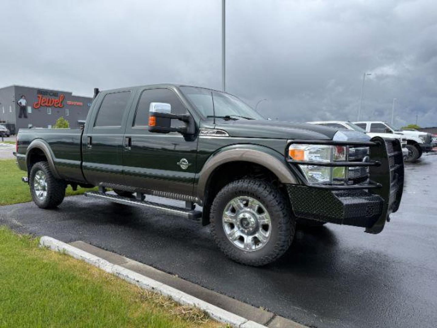2016 Green Gem Metallic /Black Ford F-350 LARIAT (1FT8W3BT7GE) with an Powerstroke 6.7L V-8 diesel direct injection engine, AUTOMATIC transmission, located at 1235 N Woodruff Ave., Idaho Falls, 83401, (208) 523-1053, 43.507172, -112.000488 - At Timberline Auto, finding a great deal on your next vehicle is always easy! Our experienced sales staff's goal is to help find you the right vehicle at the right price! Our knowledgeable finance department has options for almost any credit score. We offer extended service contract options to prote - Photo#0