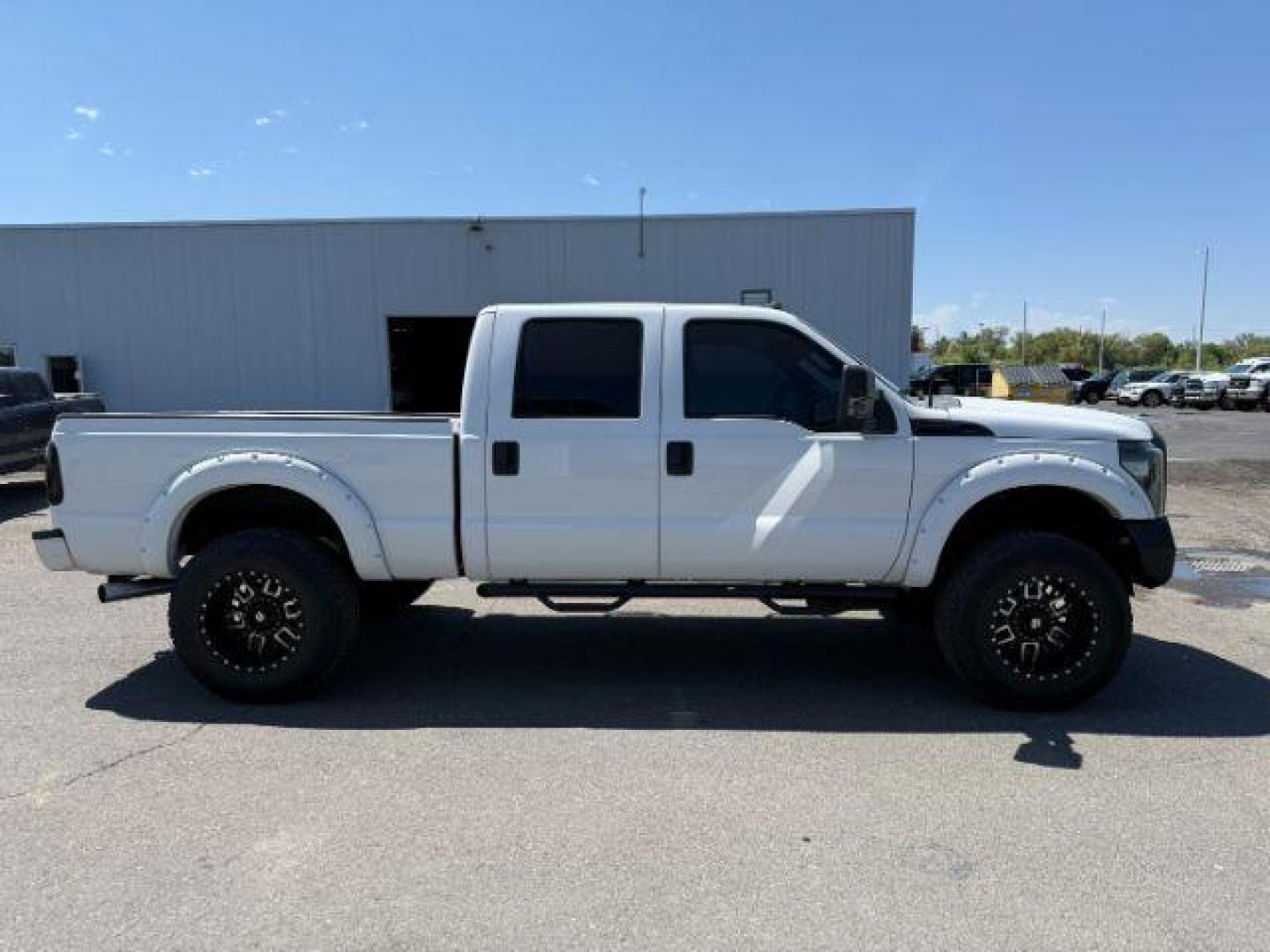 2012 Oxford White /Steel Ford F-250 XLT (1FT7W2BT7CE) with an Powerstroke 6.7L V-8 diesel direct injection engine, AUTOMATIC transmission, located at 1235 N Woodruff Ave., Idaho Falls, 83401, (208) 523-1053, 43.507172, -112.000488 - At Timberline Auto, finding a great deal on your next vehicle is always easy! Our experienced sales staff's goal is to help find you the right vehicle at the right price! Our knowledgeable finance department has options for almost any credit score. We offer extended service contract options to prote - Photo#4