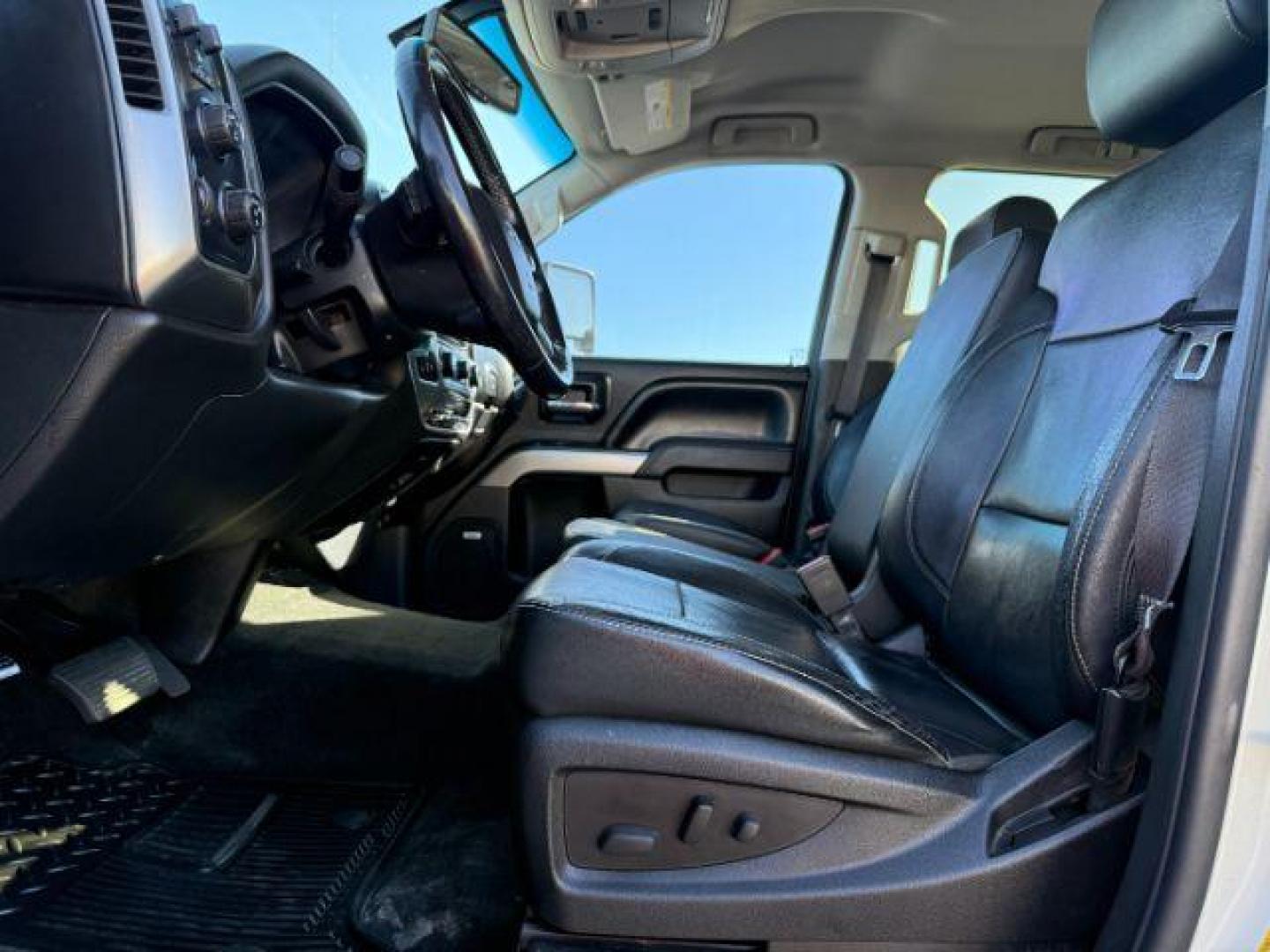 2014 WHITE /Jet Black Chevrolet Silverado 1500 (3GCUKREC8EG) with an EcoTec3 53L V-8 gasoline direct injection engine, Automatic transmission, located at 1175 N Woodruff Ave, Idaho Falls, ID, 83401, 43.506901, -111.999657 - At Timberline Auto, finding a great deal on your next vehicle is always easy! Our experienced sales staff's goal is to help find you the right vehicle at the right price! Our knowledgeable finance department has options for almost any credit score. We offer extended service contract options to prote - Photo#34